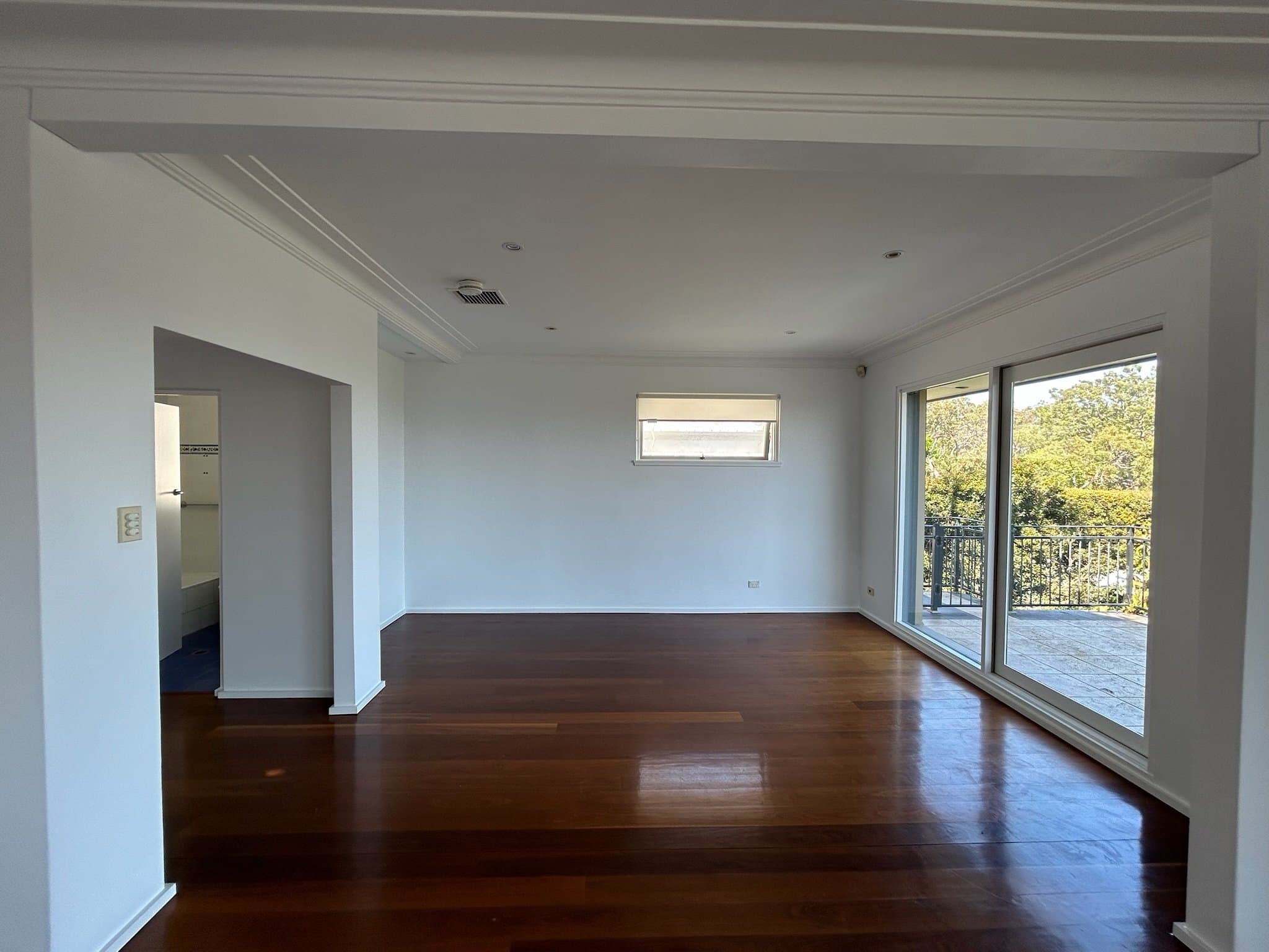 Balgowlah Heights living room after interior repainting with balcony doors