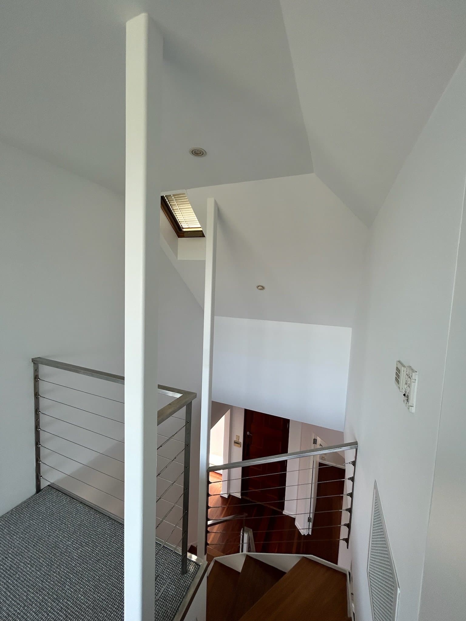 Upper stairwell and landing after interior painting in Balgowlah Heights