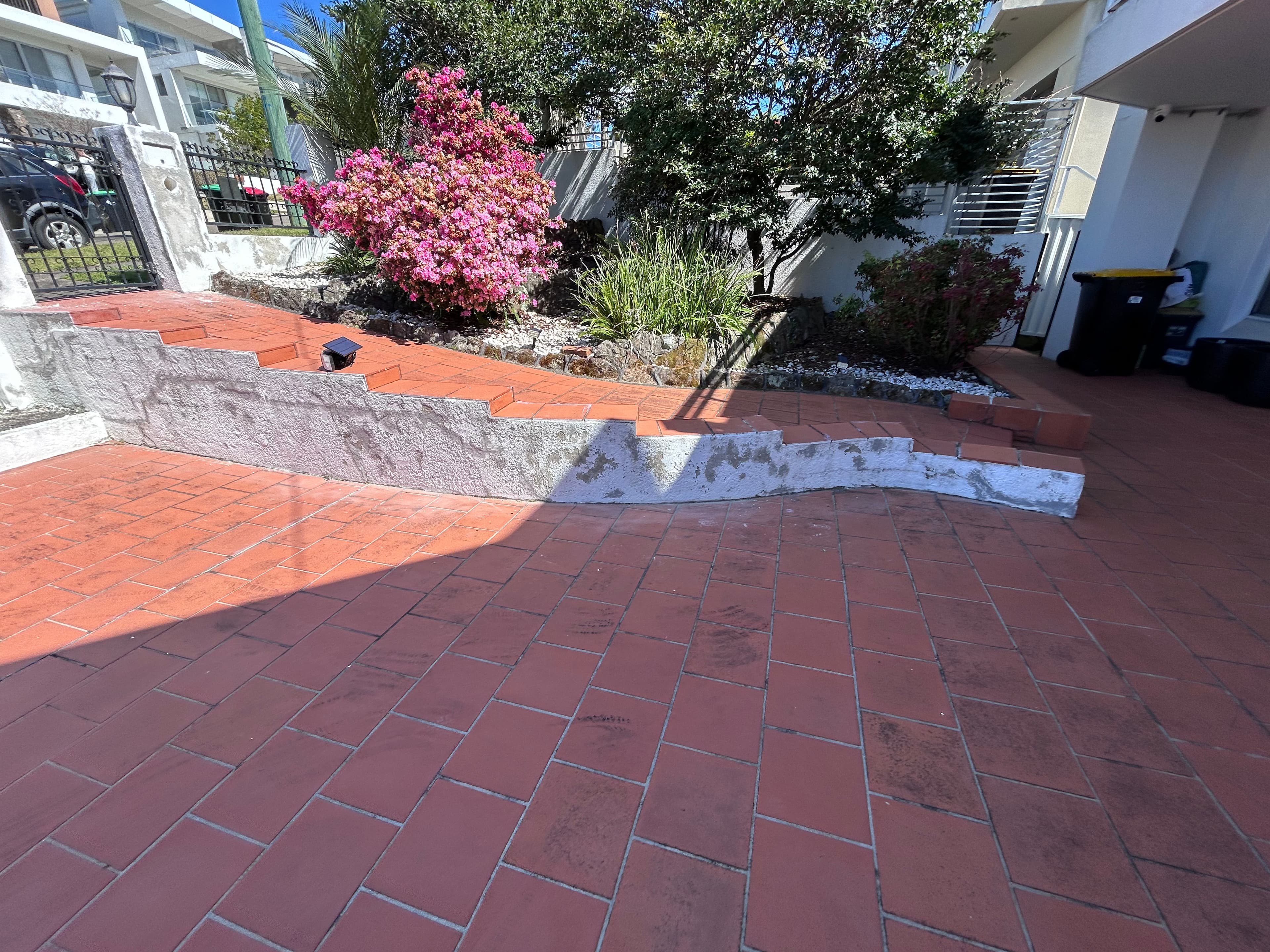 Selected low retaining-wall section before repainting in Blakehurst