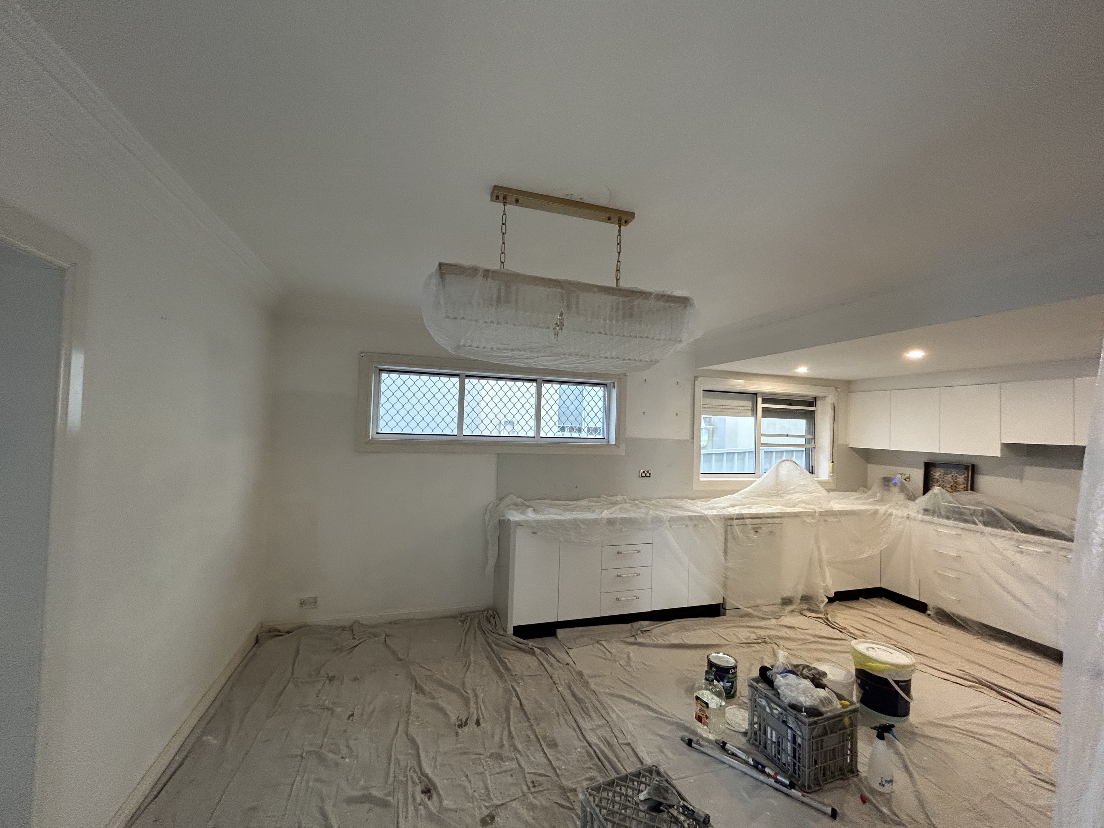 Blakehurst kitchen and dining area during preparation before interior repainting
