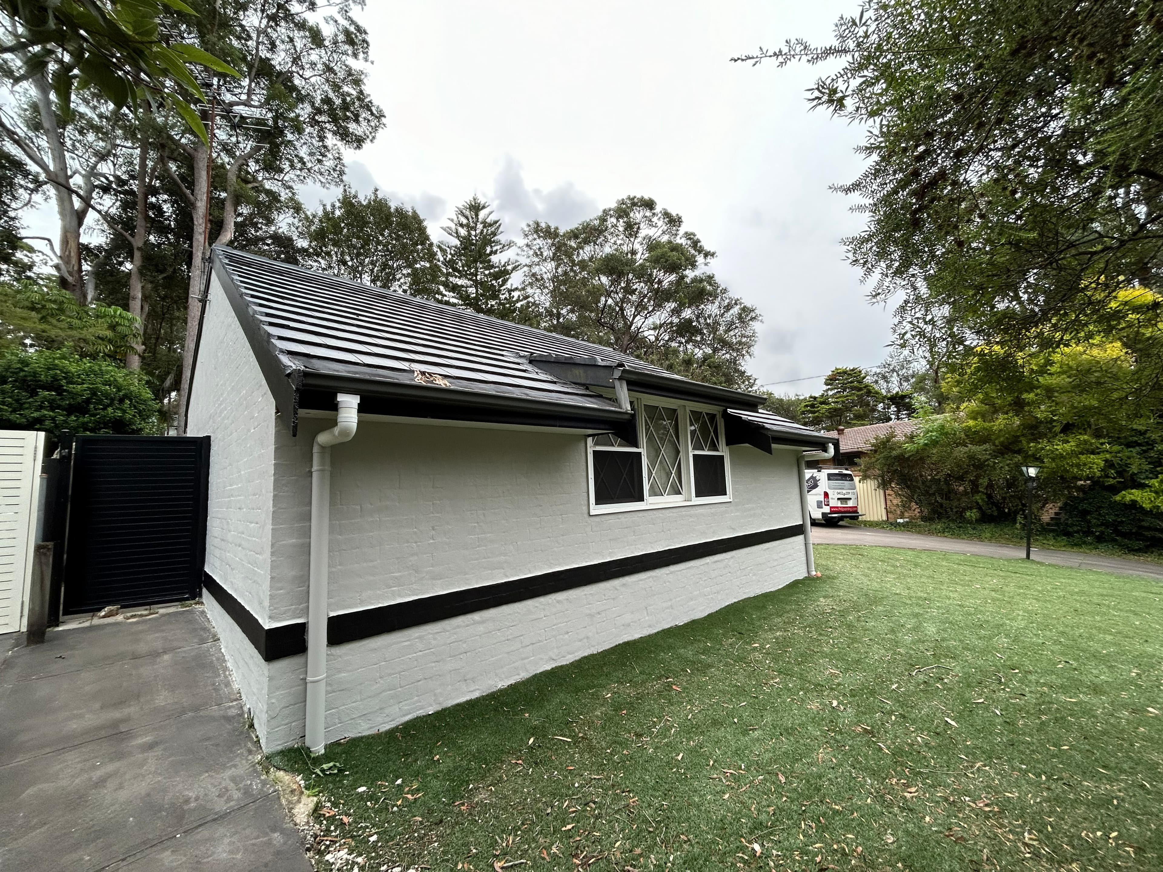 Carlingford side lawn elevation after exterior repainting
