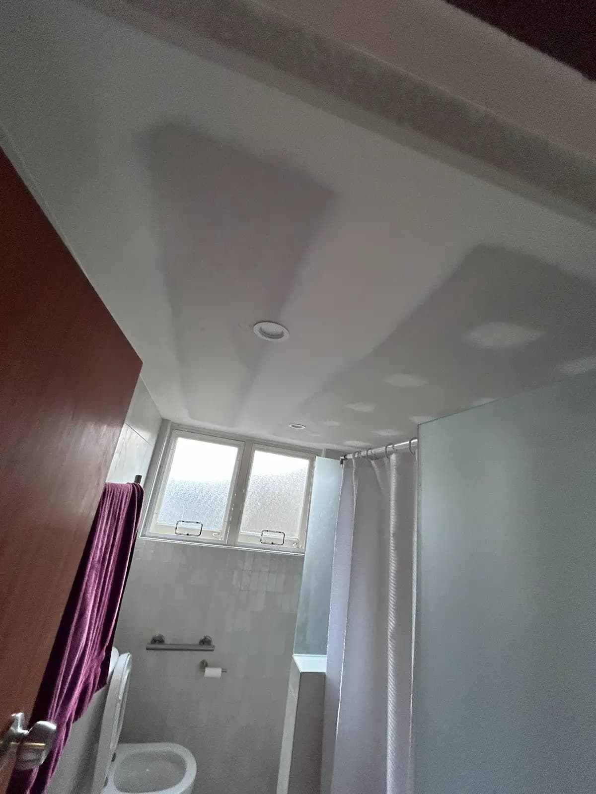 Chatswood apartment bathroom and hallway before interior repainting