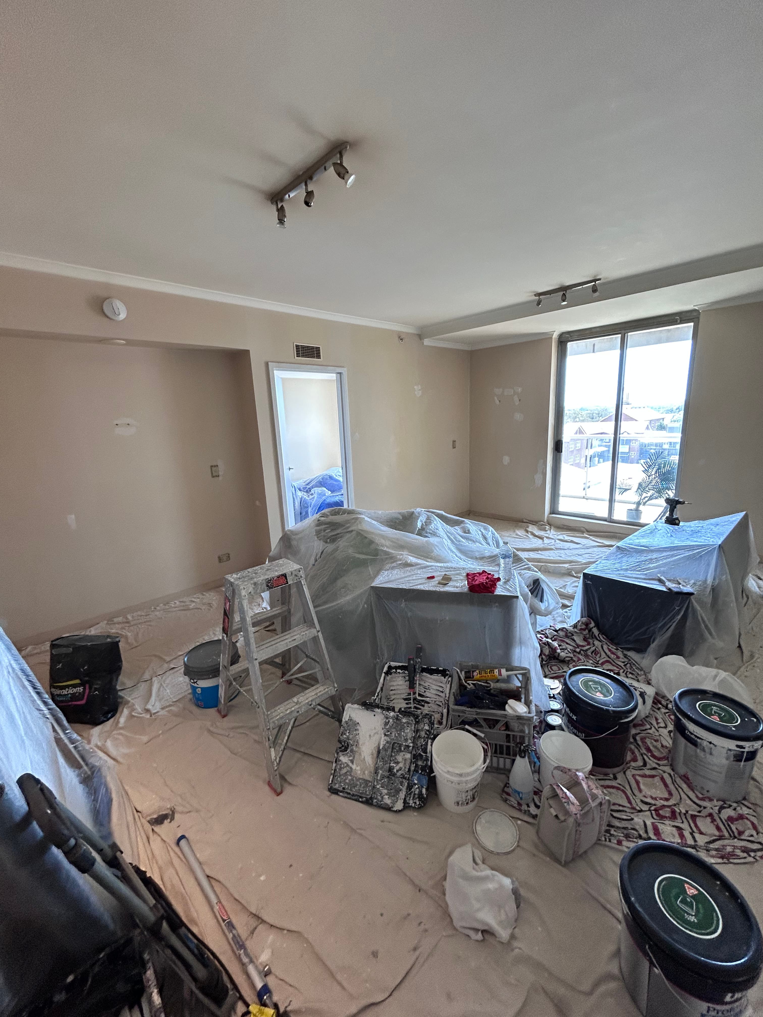 Chatswood apartment living room before interior repainting preparation
