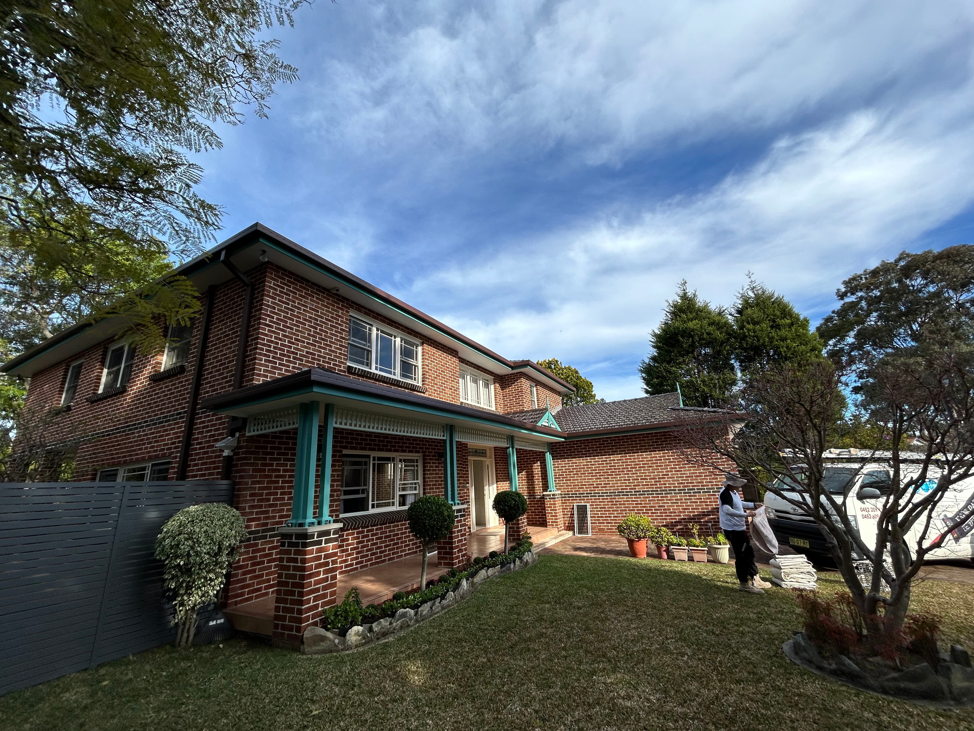 Chatswood side elevation with refreshed trims and brick exterior after painting