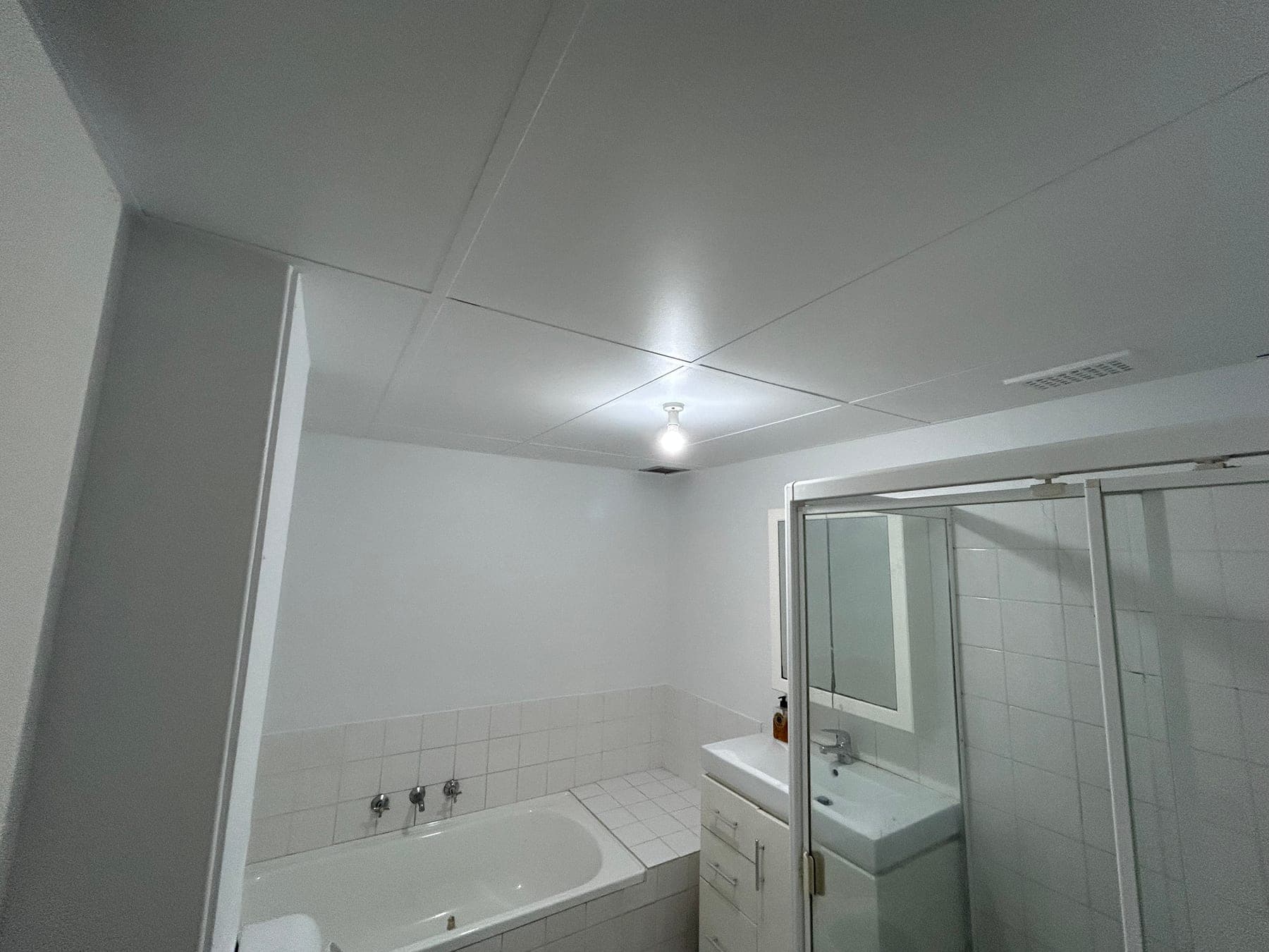 Chatswood bathroom ceiling after repainting by F&S Painting