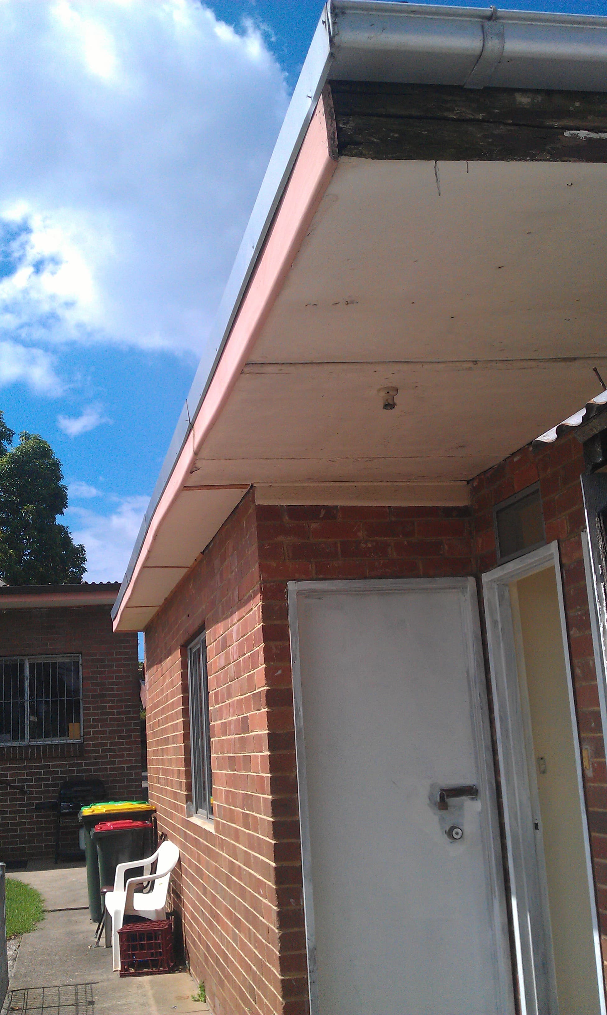 Concord West exterior soffit and trim before repainting