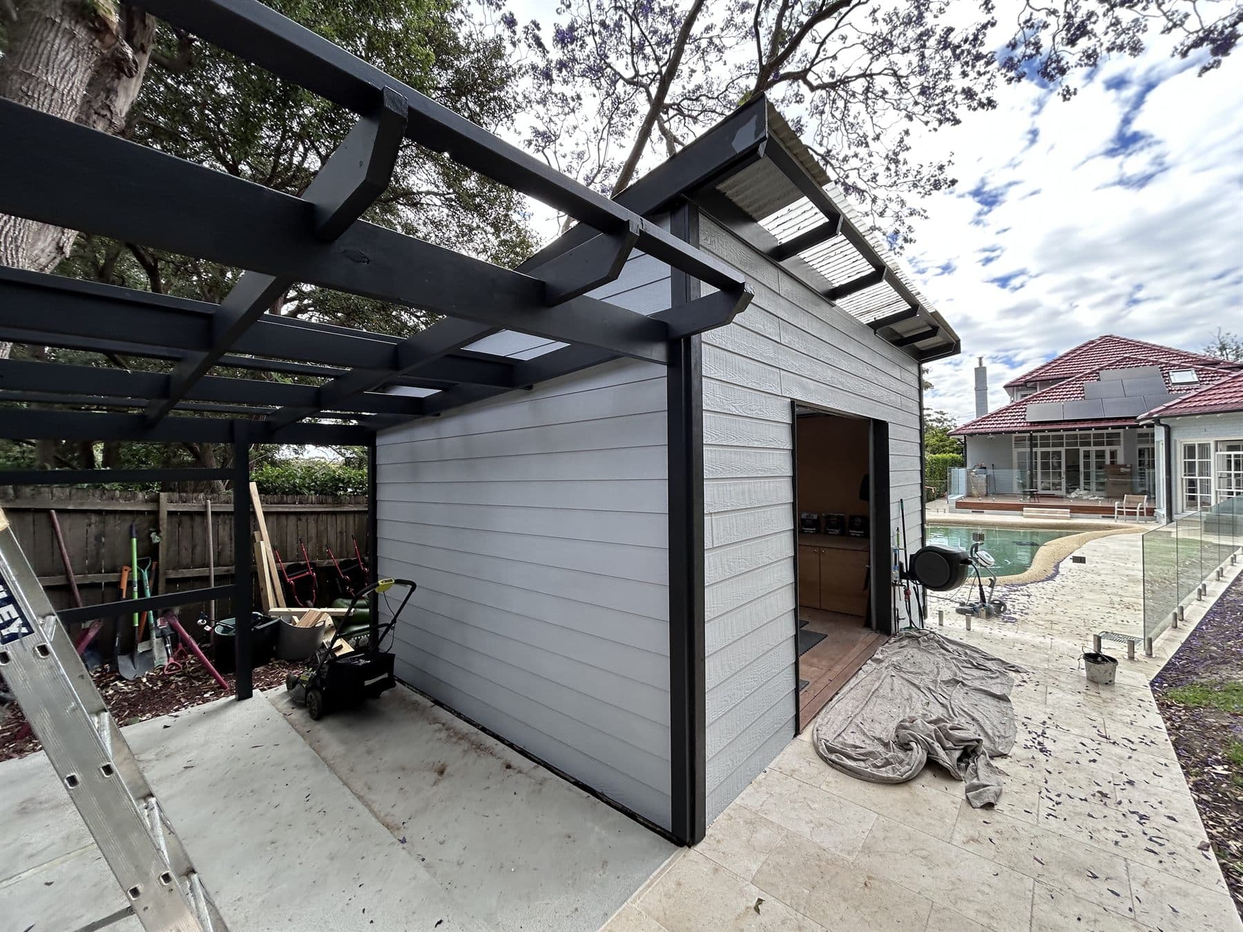 East Lindfield exterior outbuilding after repainting with fresh wall, roofline, and trim finishes