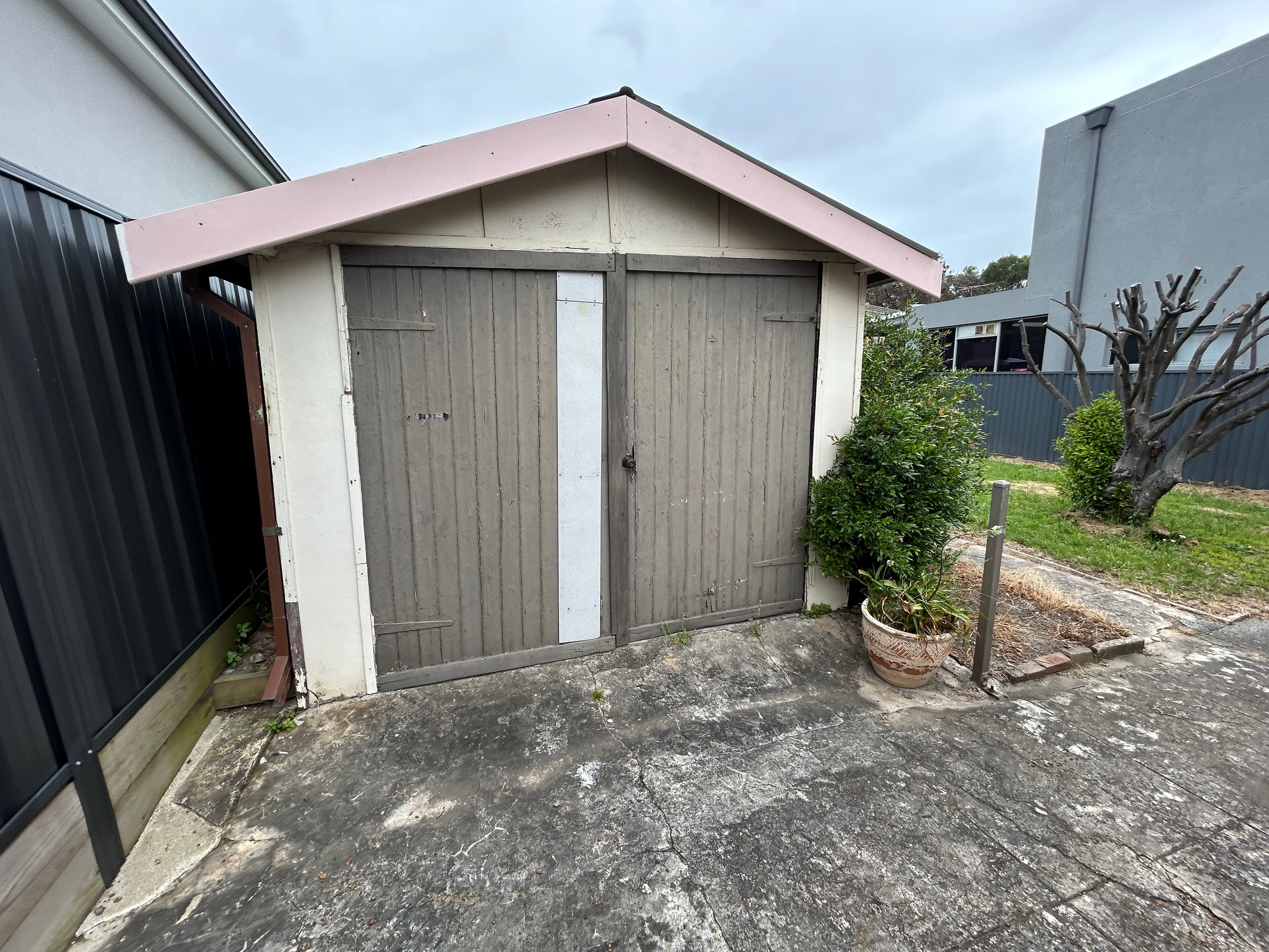 Exterior shed doors and trim before repainting
