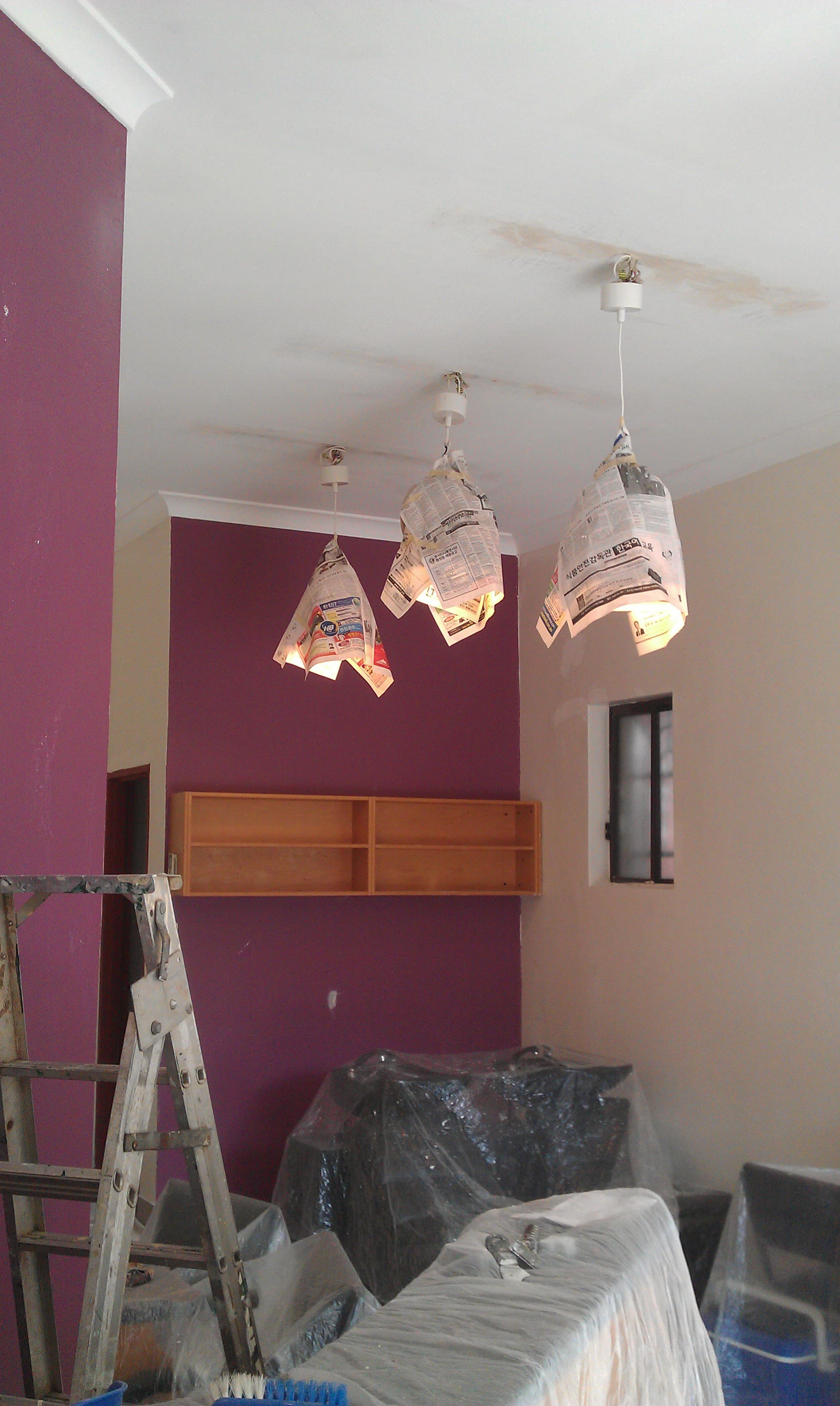 Interior feature wall and ceiling before repainting in Sydney