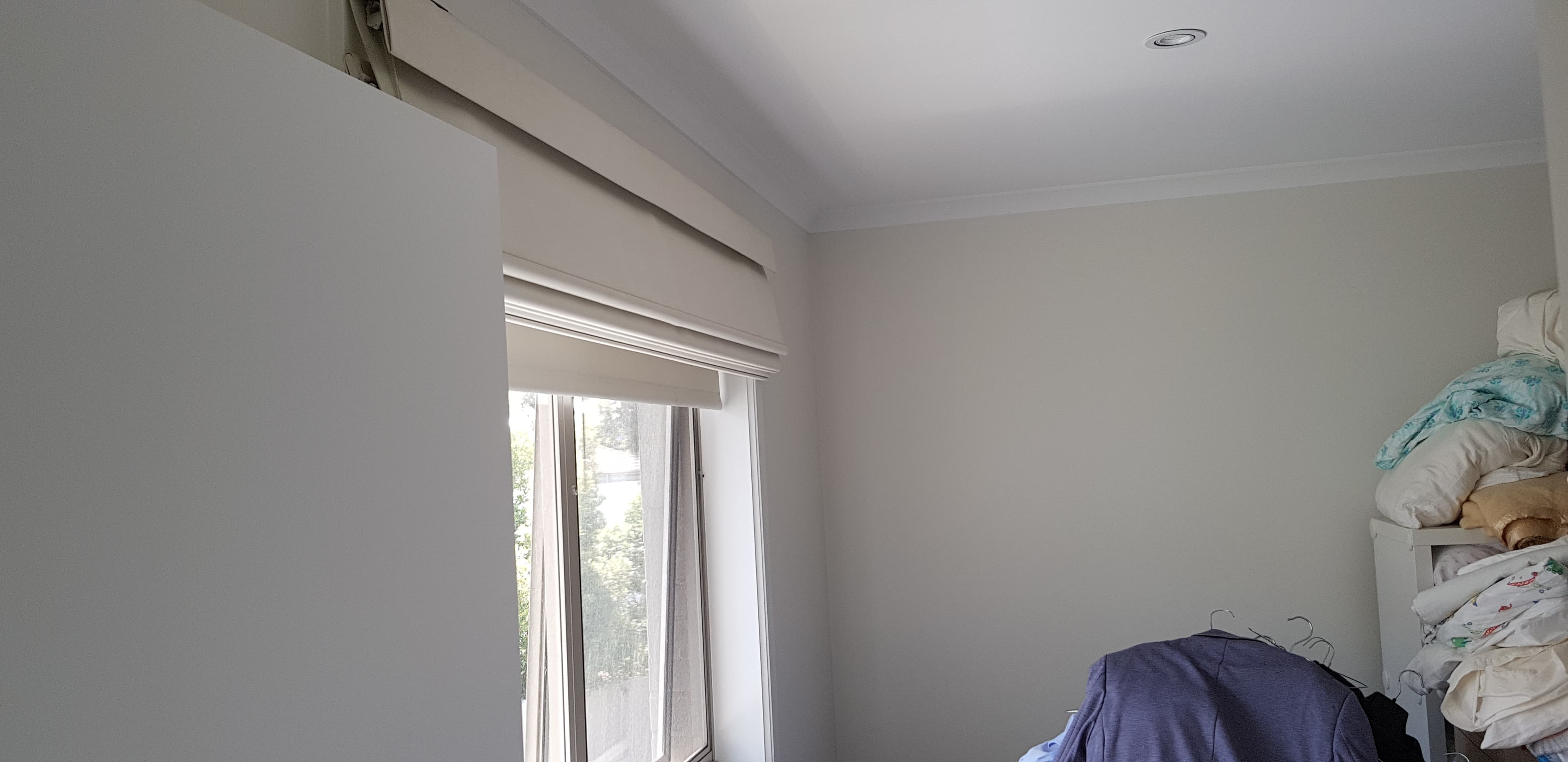 Newington bedroom wall and window area after interior repainting