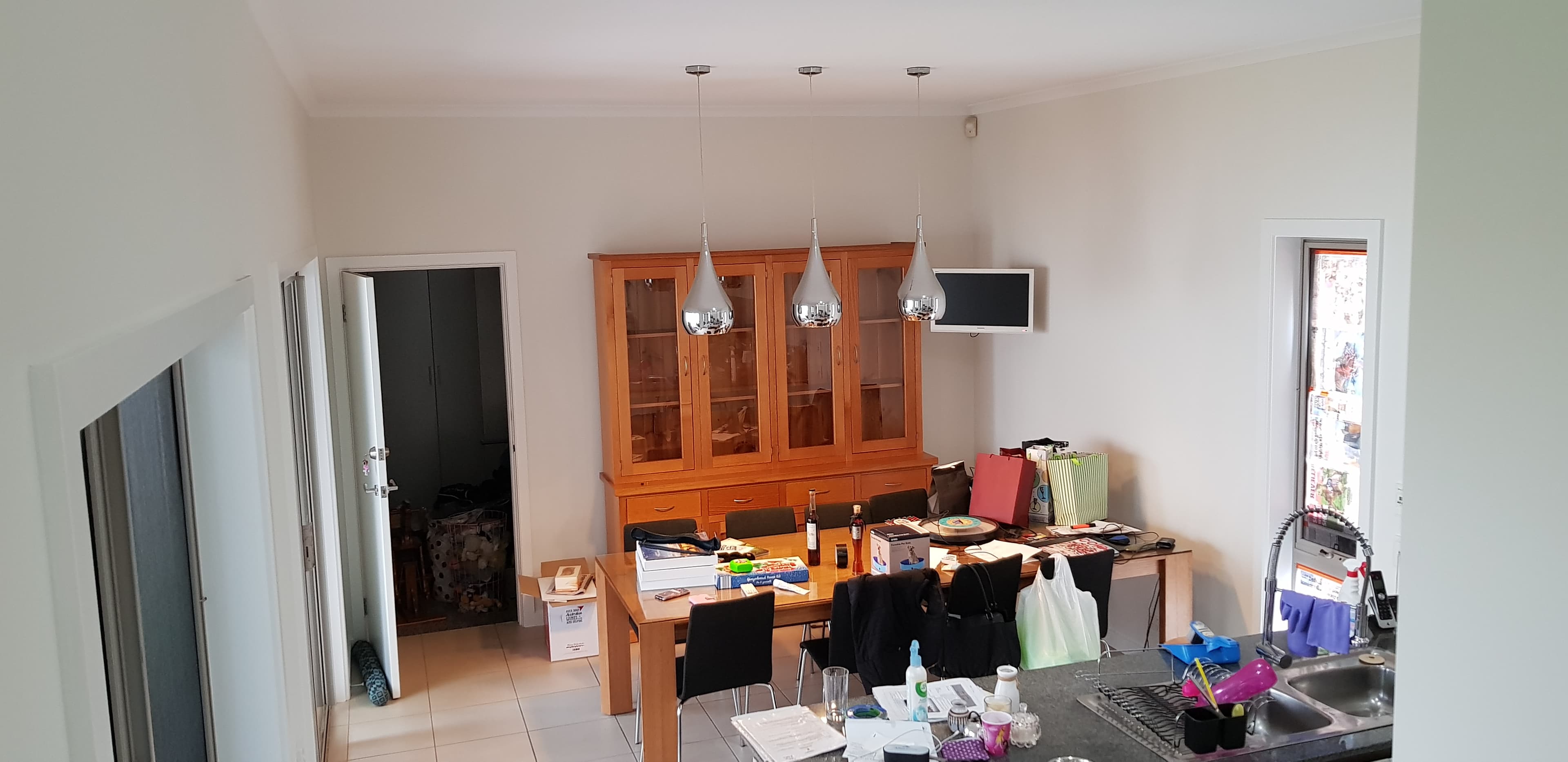 Newington dining area after interior wall and ceiling repainting