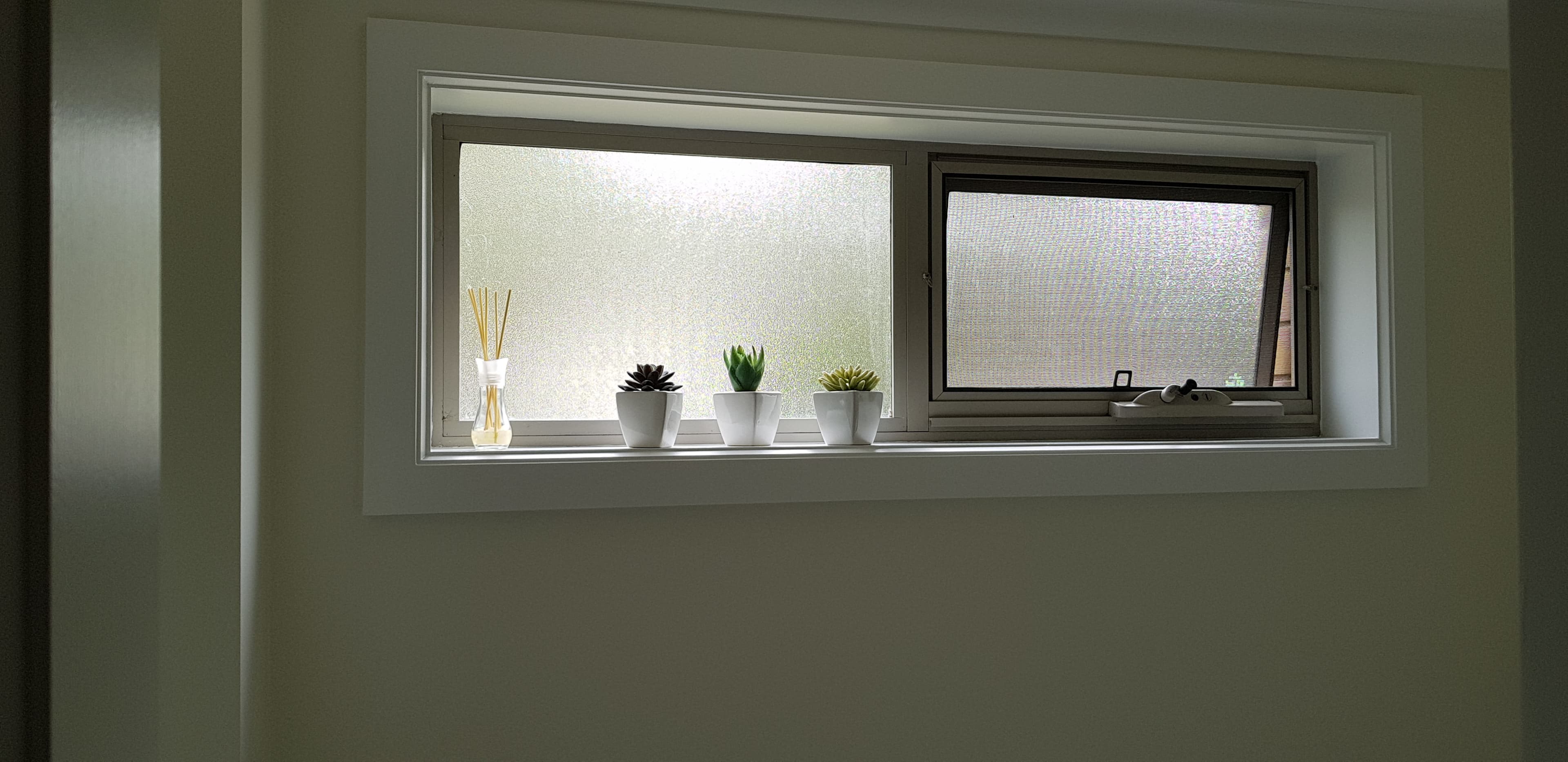 Newington interior window wall and trim after repainting