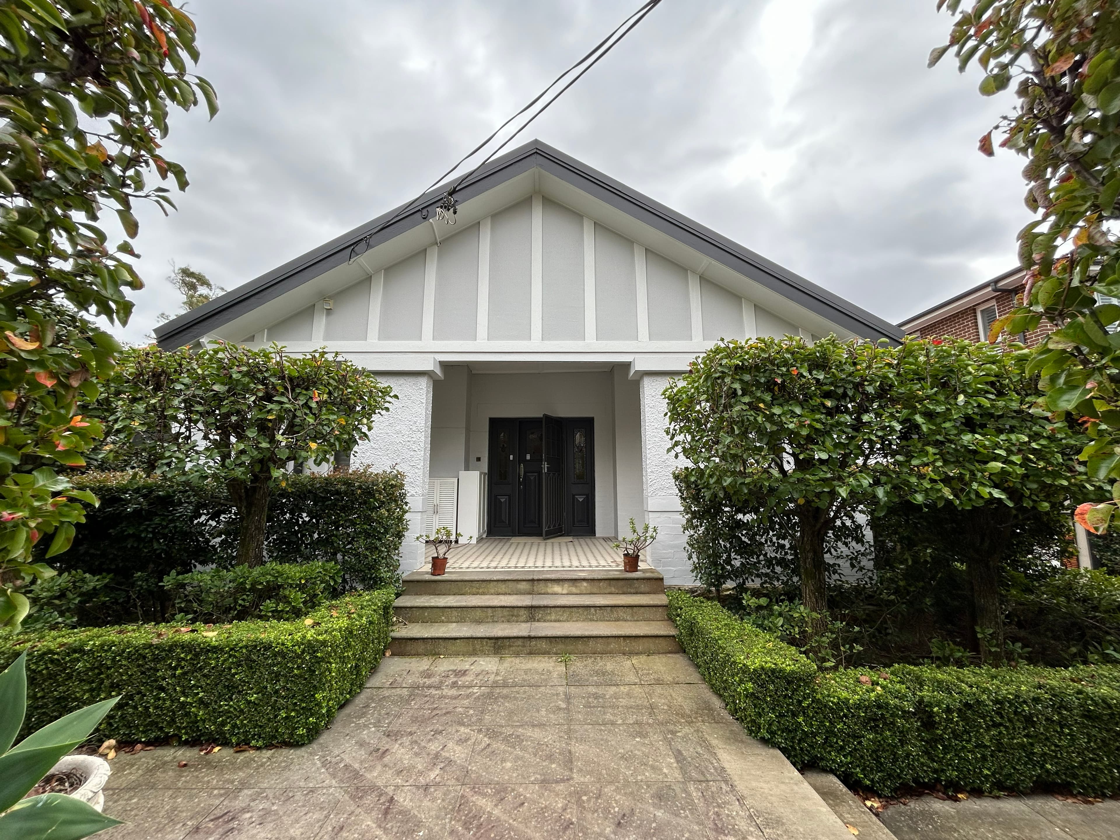 North Willoughby front entry facade after exterior painting