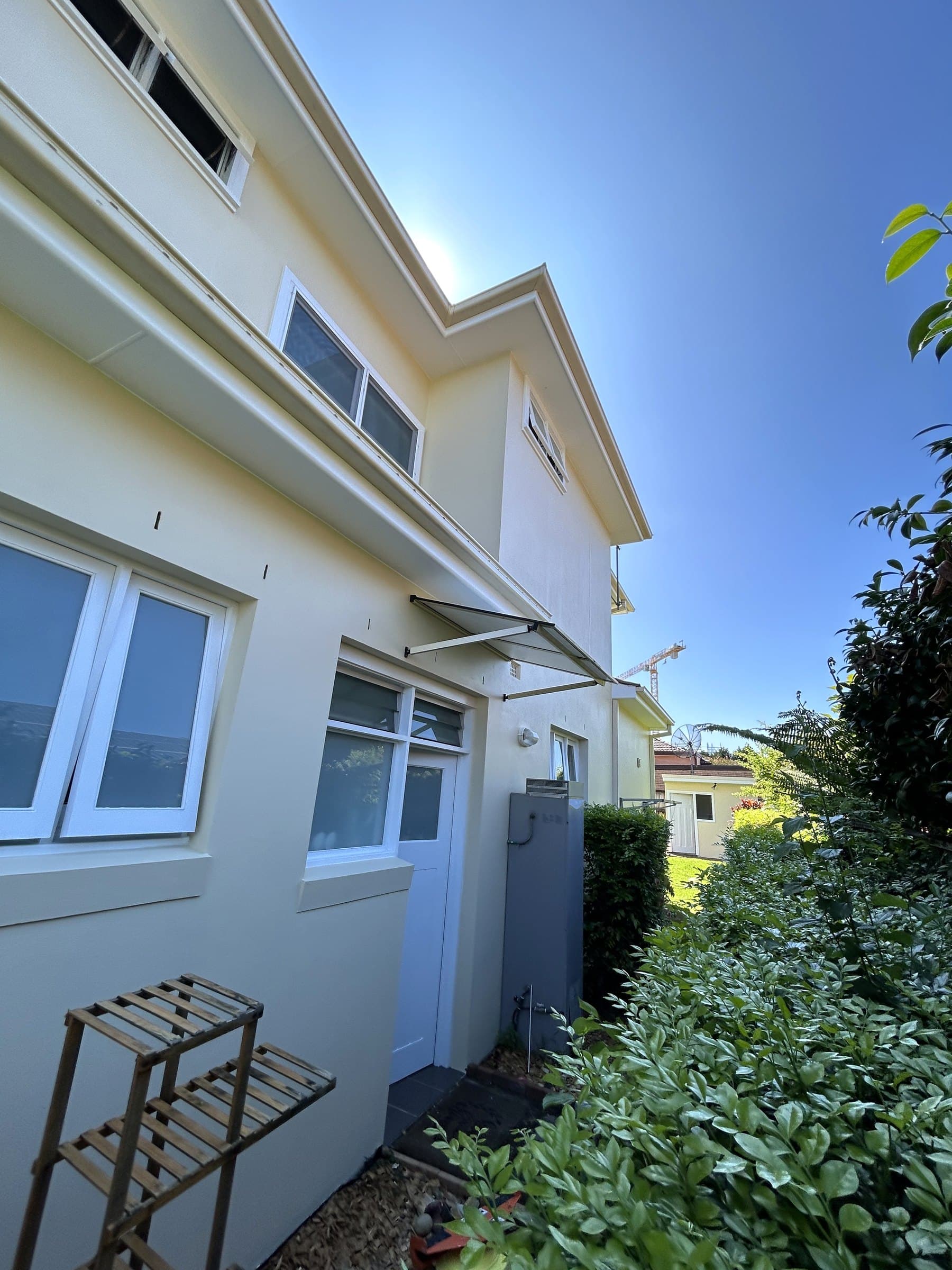North Willoughby side eaves and windows after exterior painting