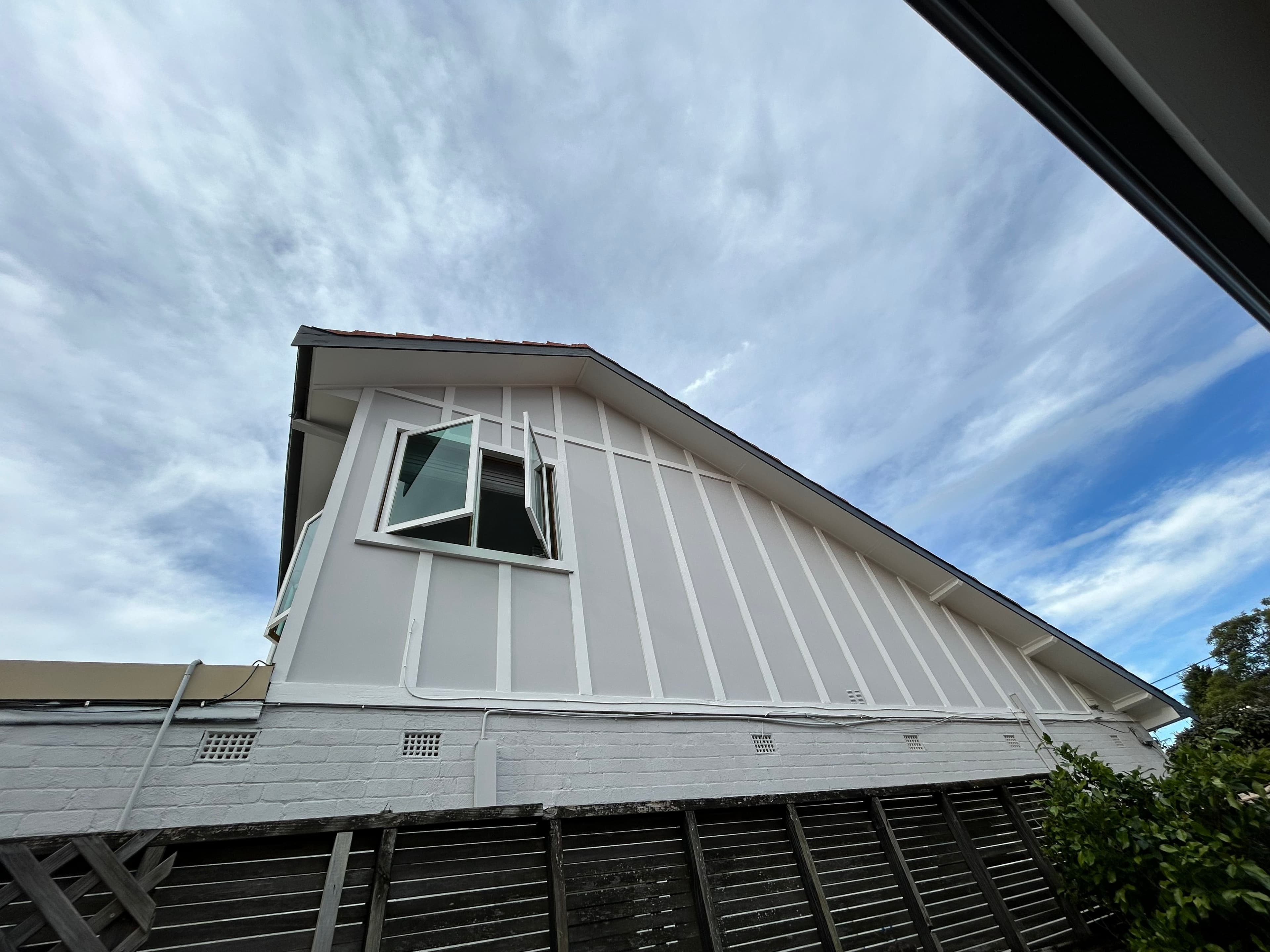 North Willoughby upper gable wall and trim after exterior painting