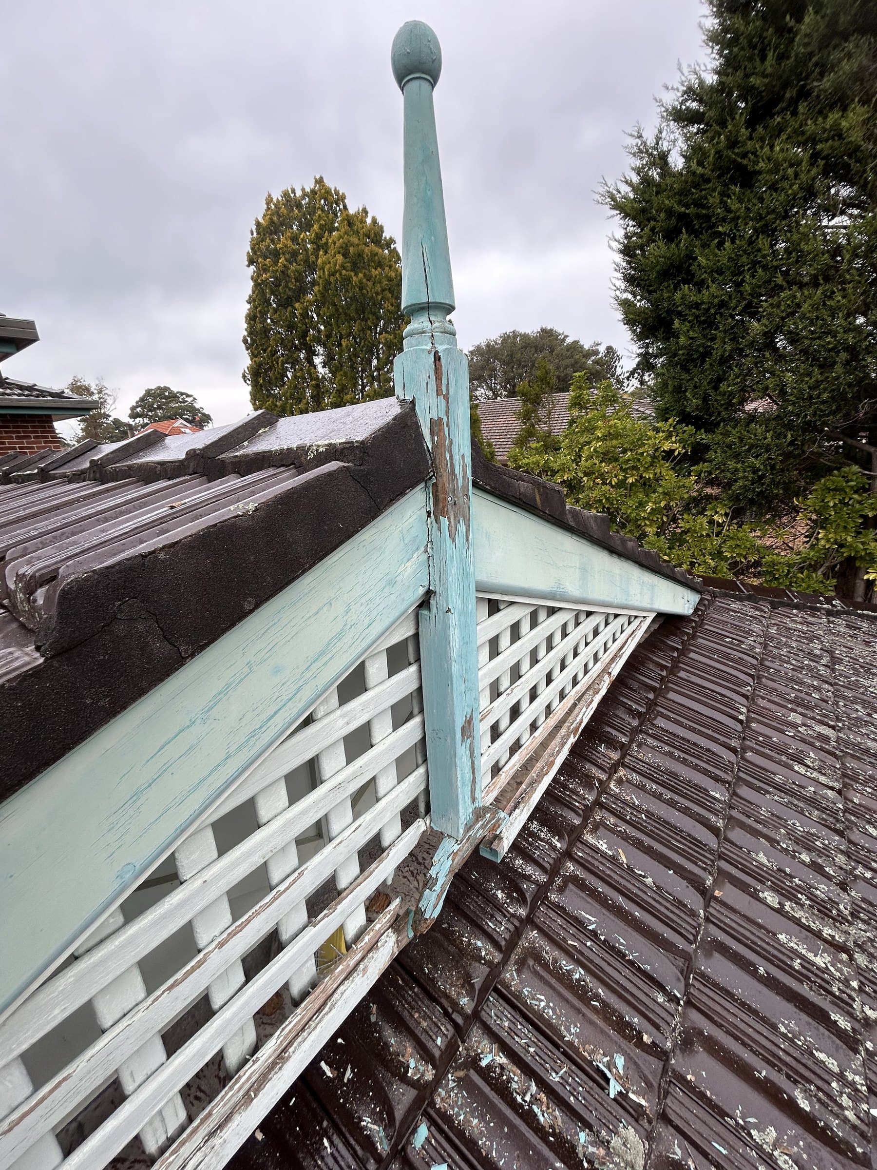 North Willoughby gable timber detail and roofline before exterior repainting