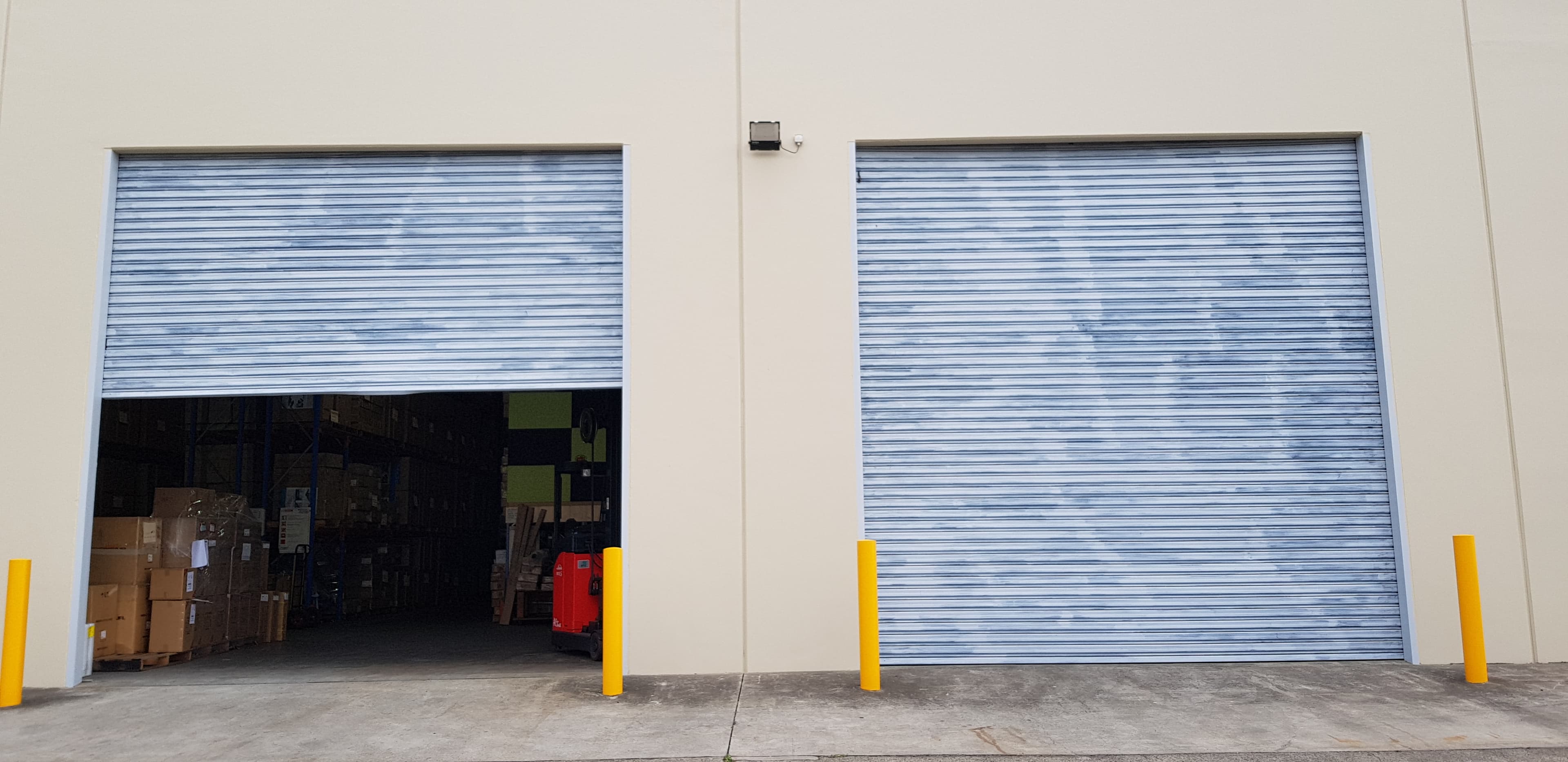 Wetherill Park commercial roller doors before repainting