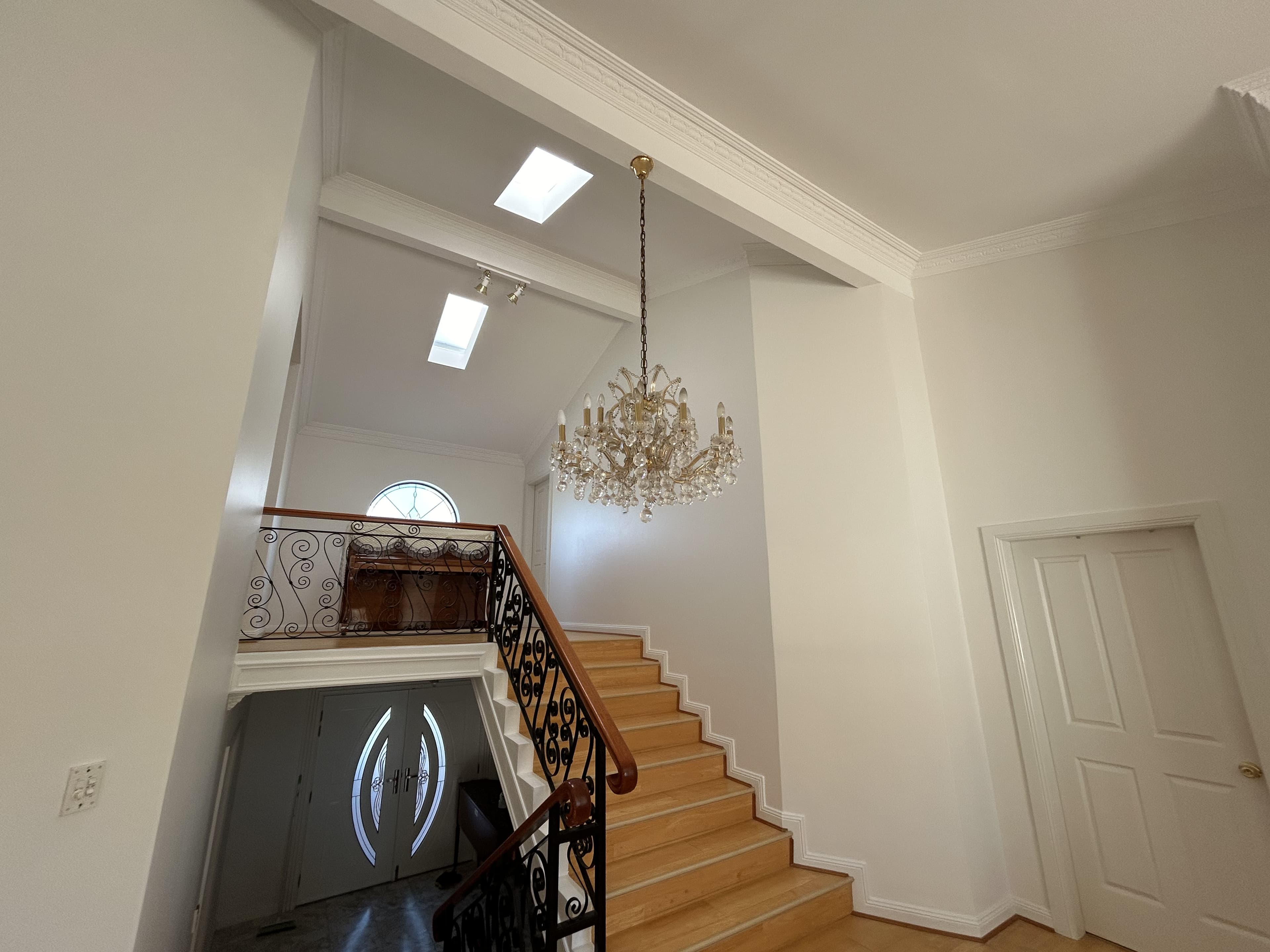 Blakehurst entry staircase and skylight area after interior painting
