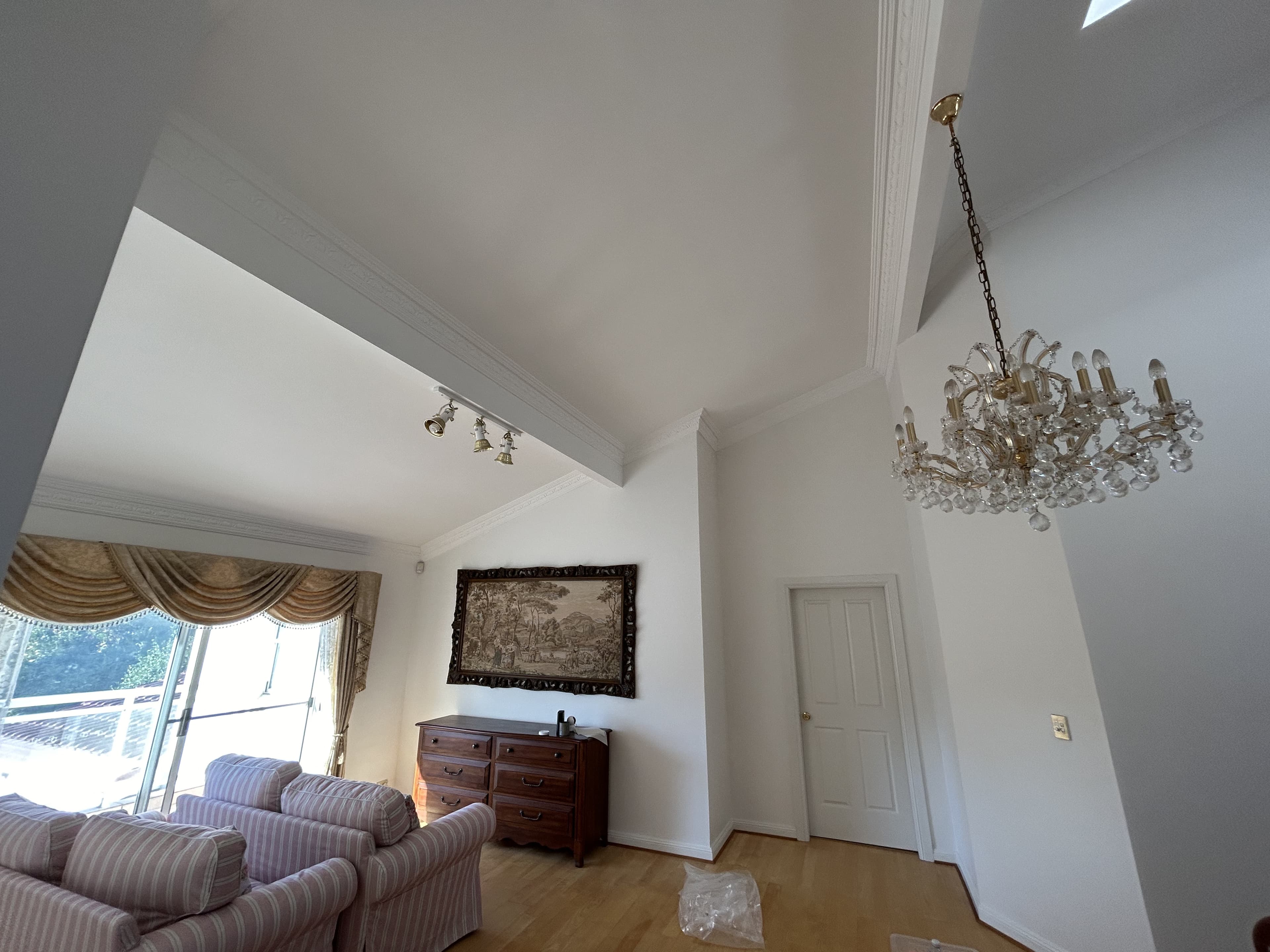 Blakehurst living room and high wall area after interior painting