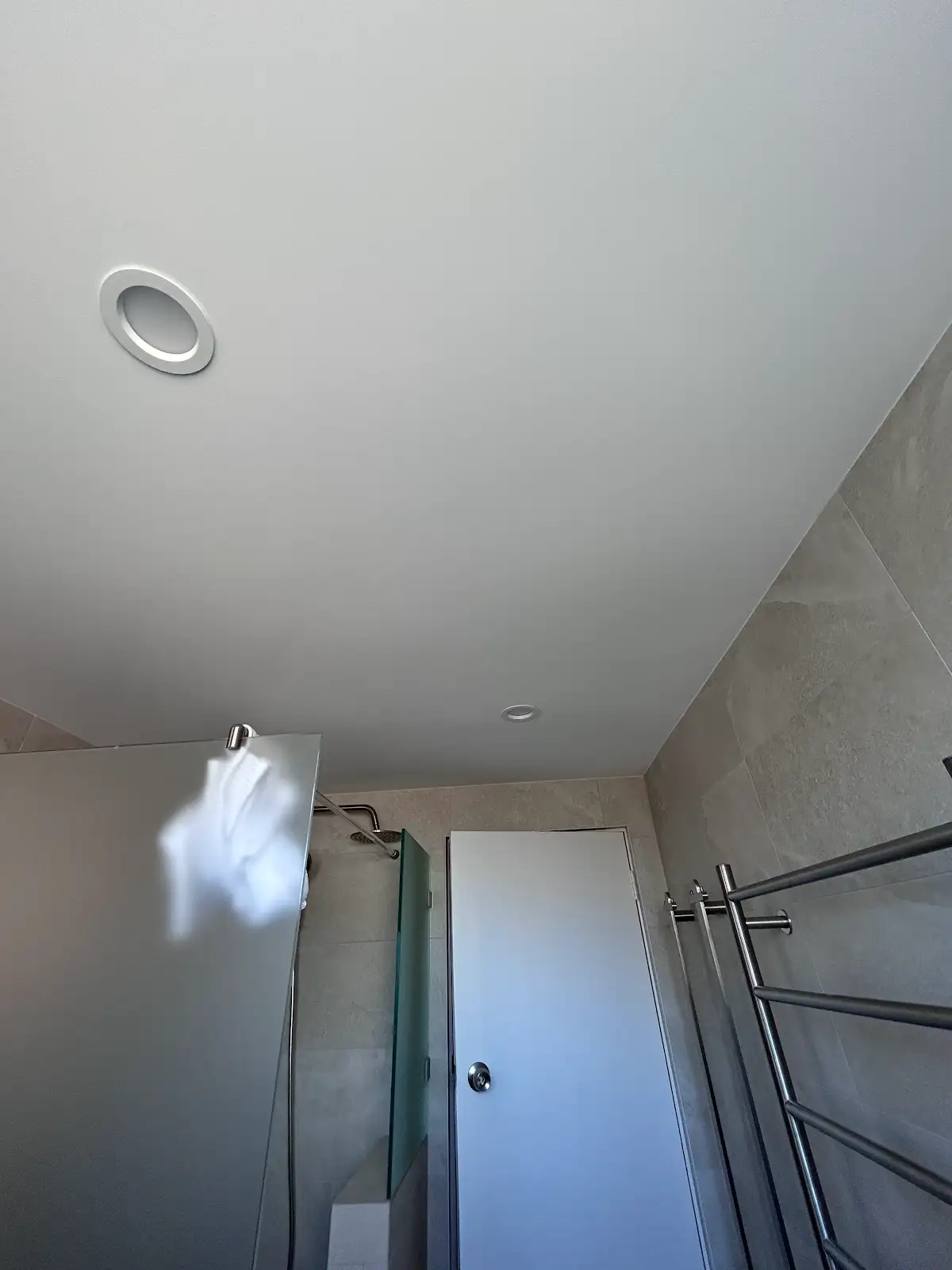Chatswood apartment bathroom ceiling and upper wall detail after repainting