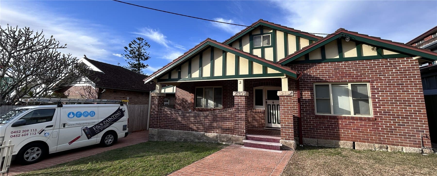 Chatswood brick home front facade after exterior gable and trim repainting