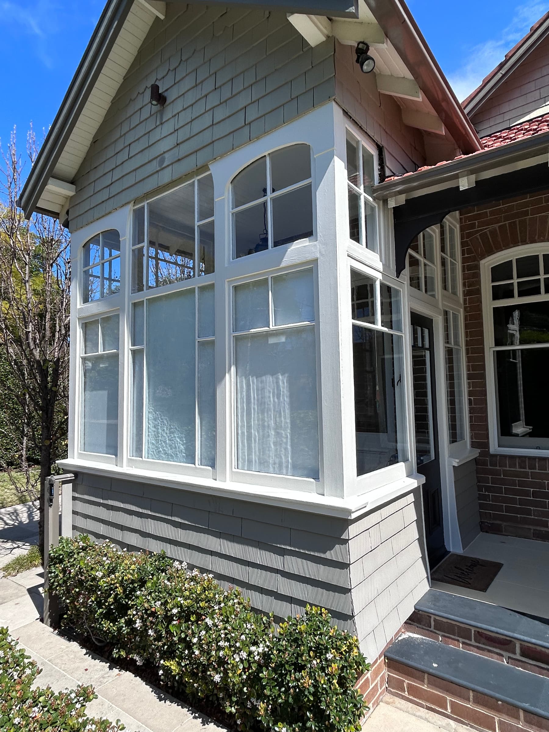 Tall Chatswood bay window after white timber frame painting