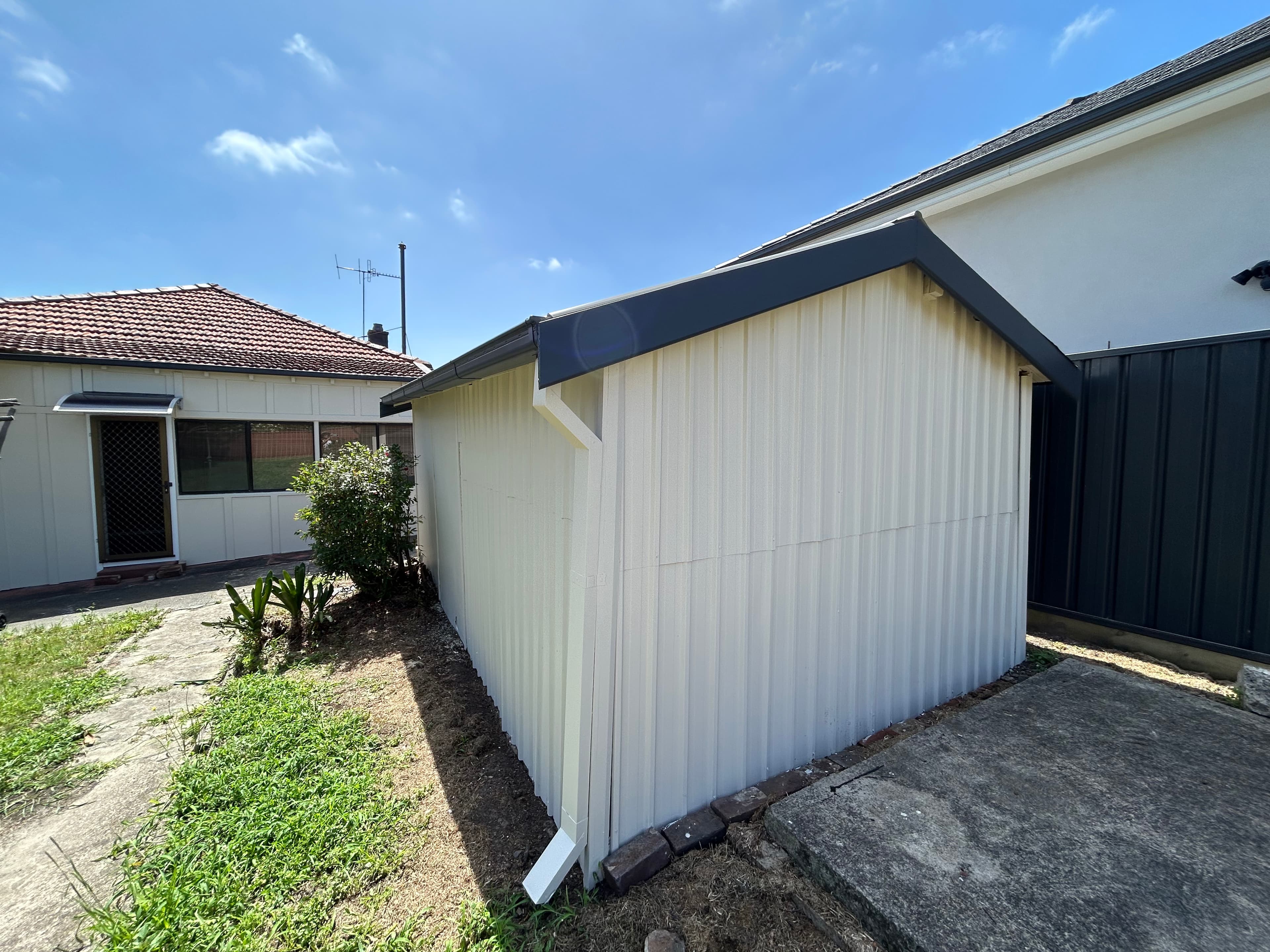 Earlwood outbuilding side after exterior painting
