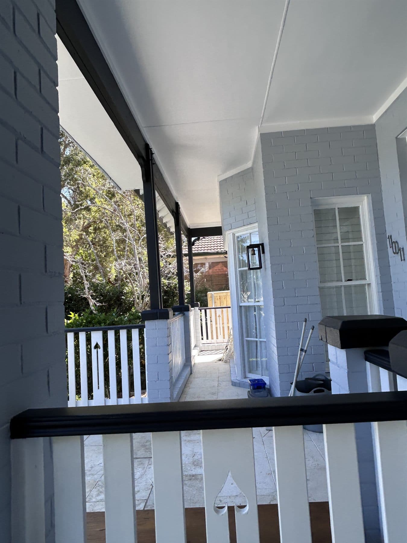 East Lindfield verandah ceiling, brickwork, railing, and trim after repainting