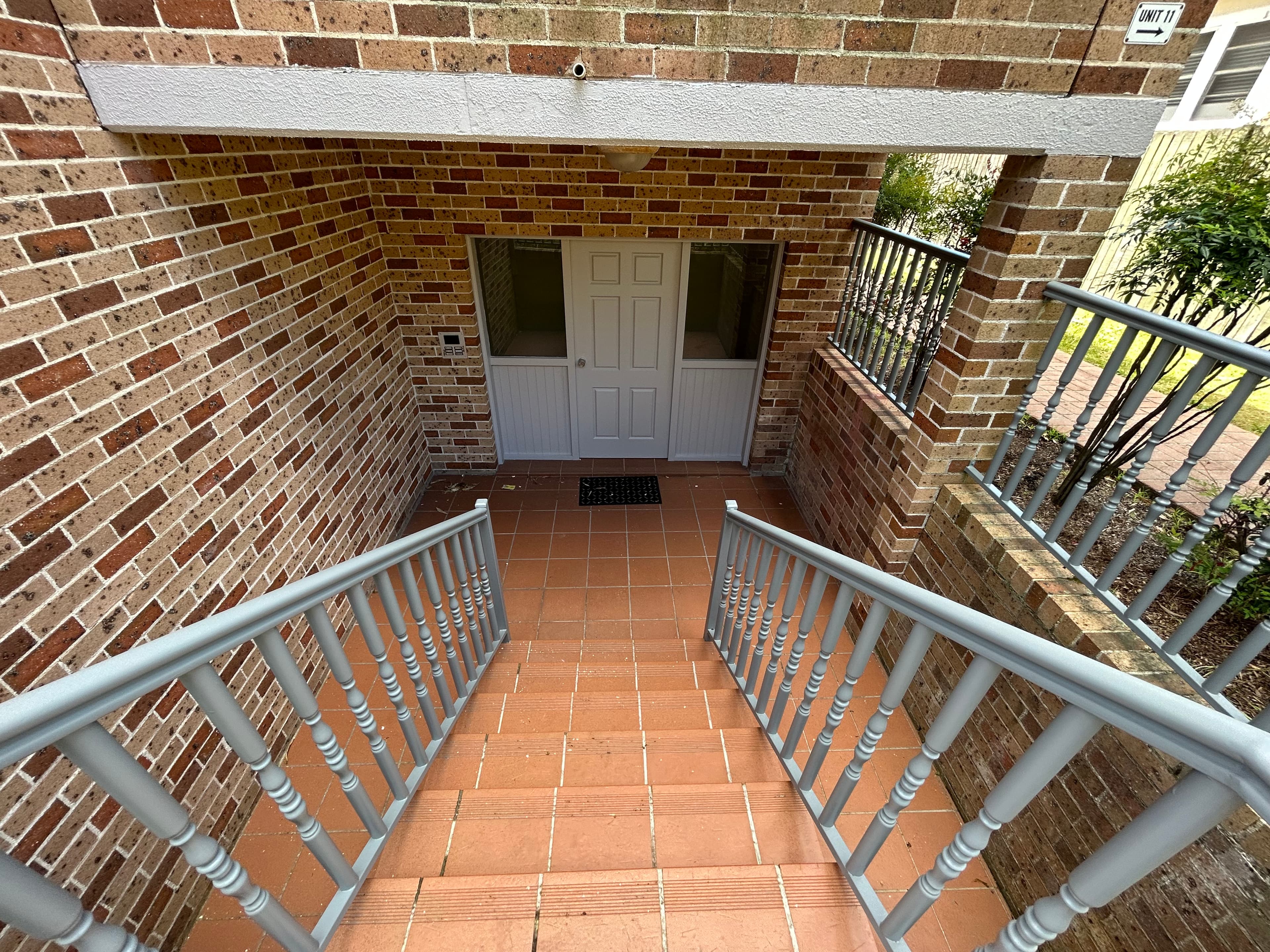 Narwee strata lower entry door and stair area after painting refresh