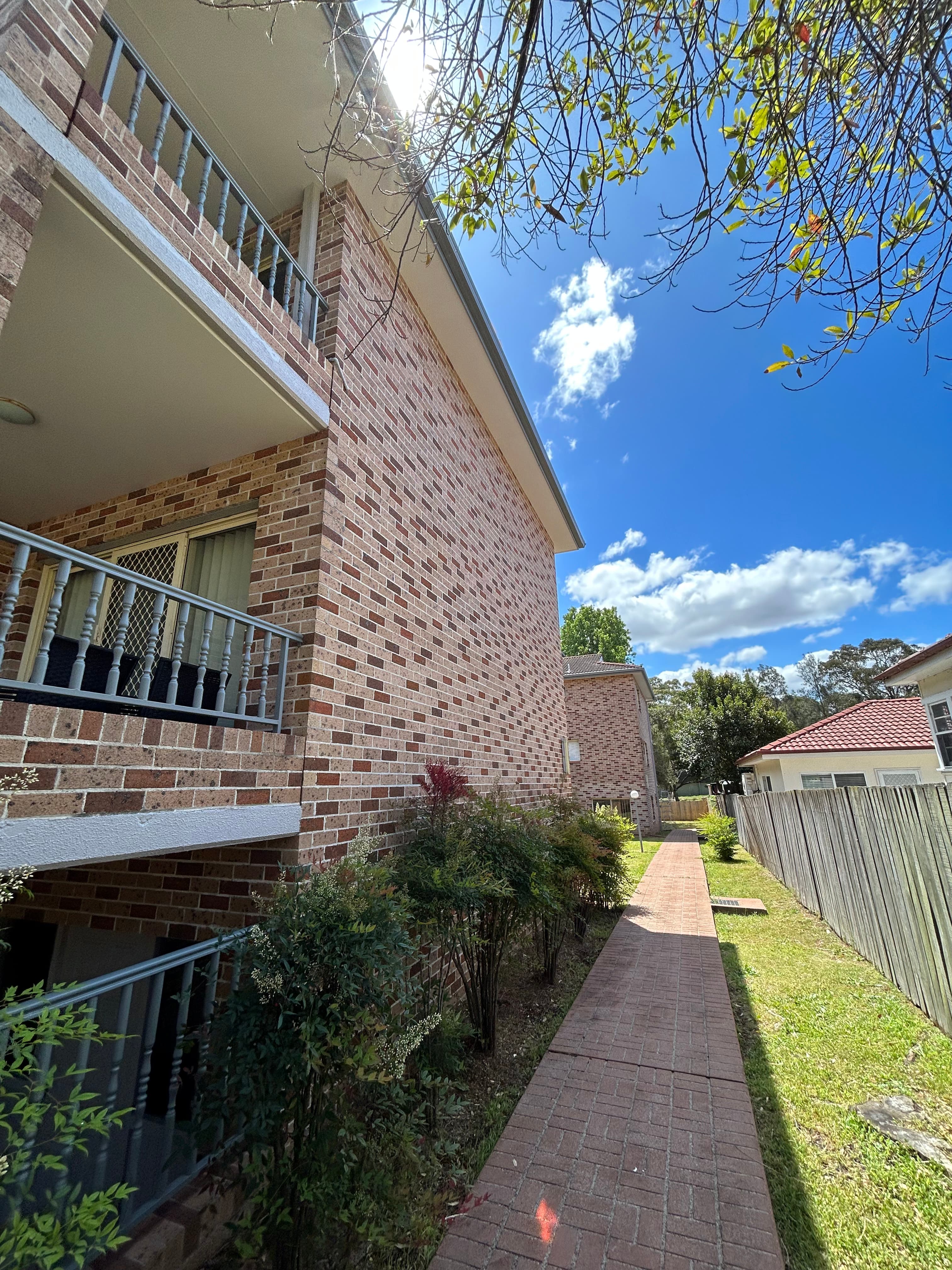 Narwee strata side path and exterior wall after painting refresh