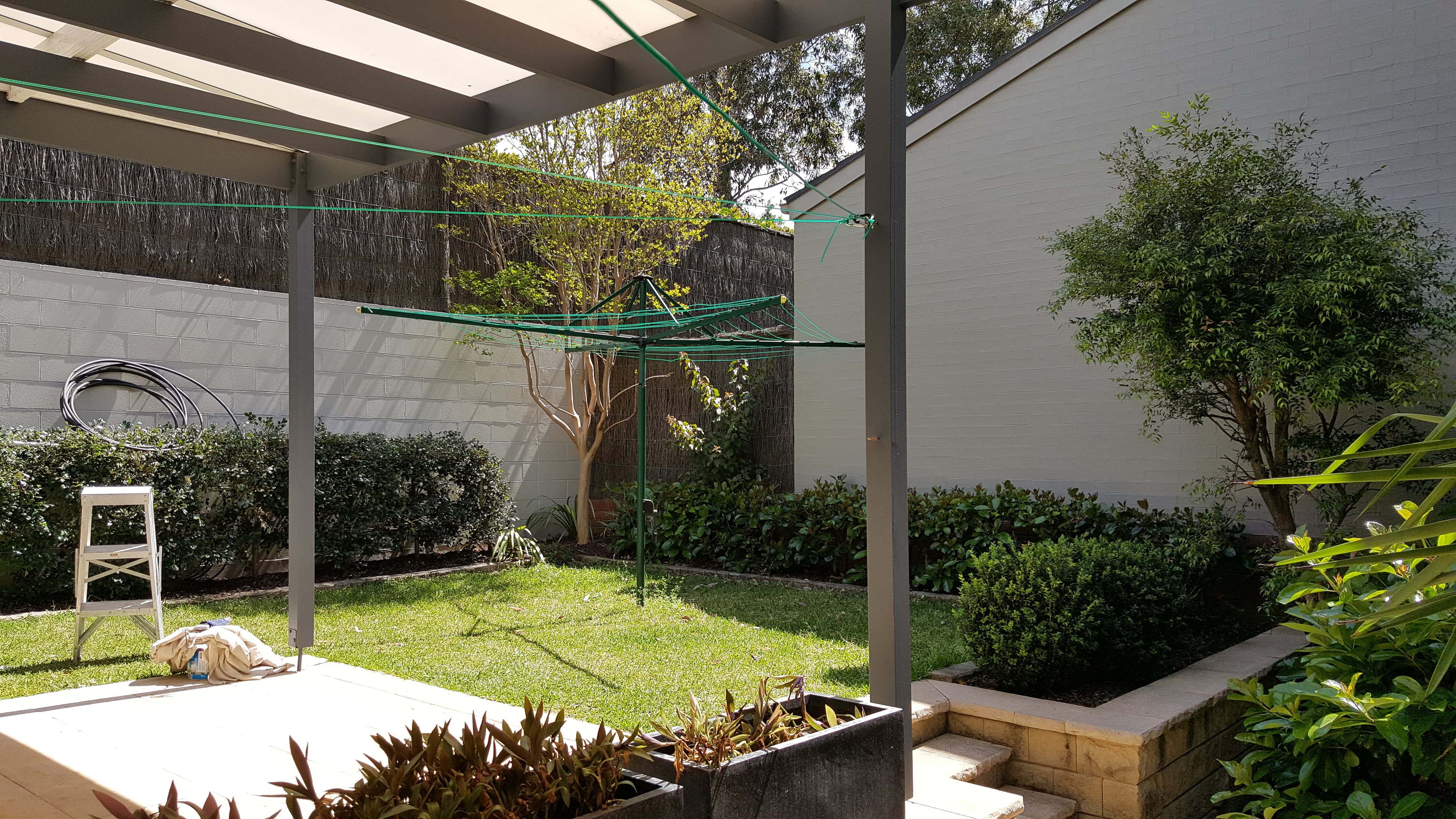 Newington courtyard boundary walls after exterior repainting