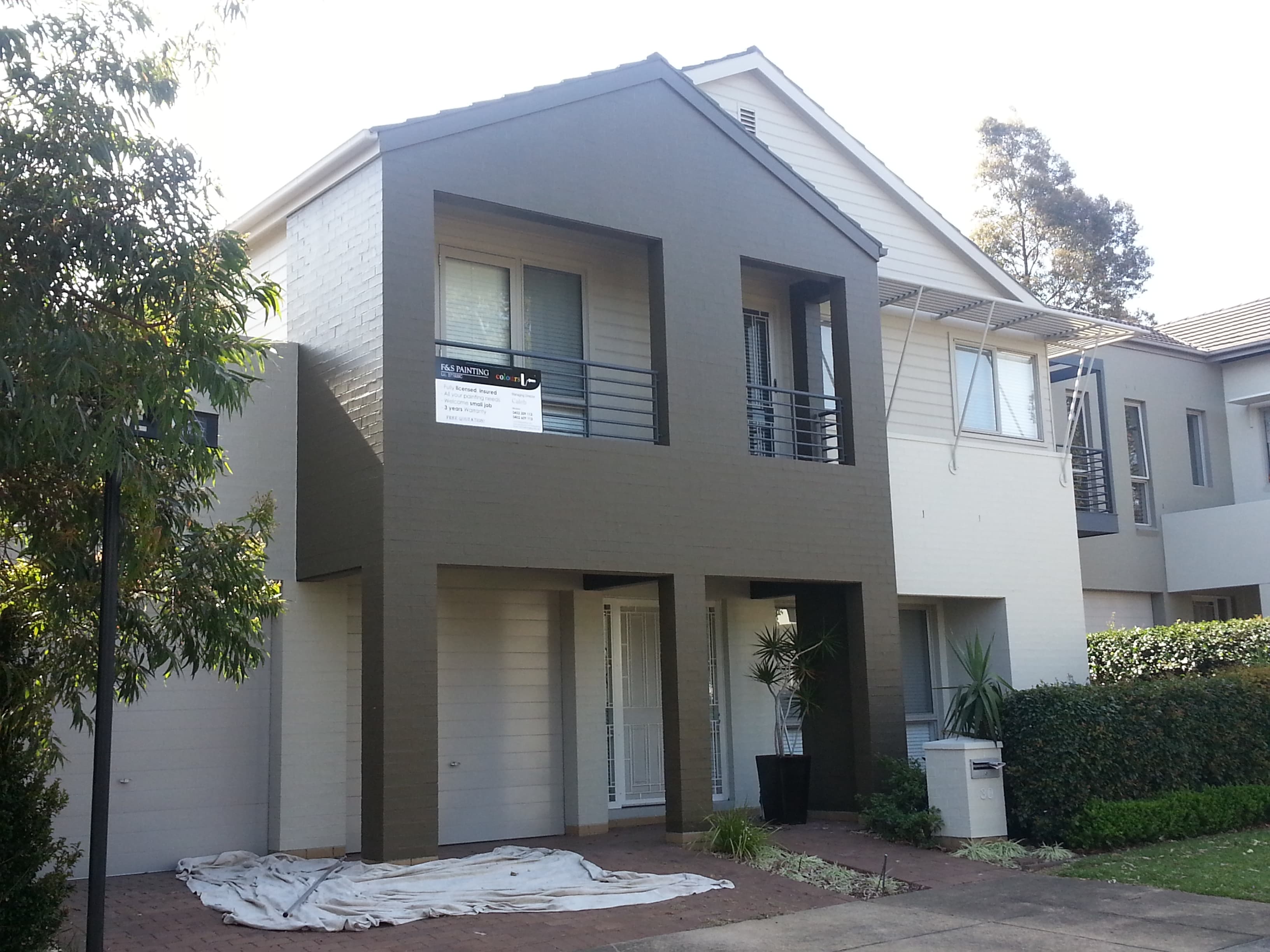 Newington front facade after exterior house repainting