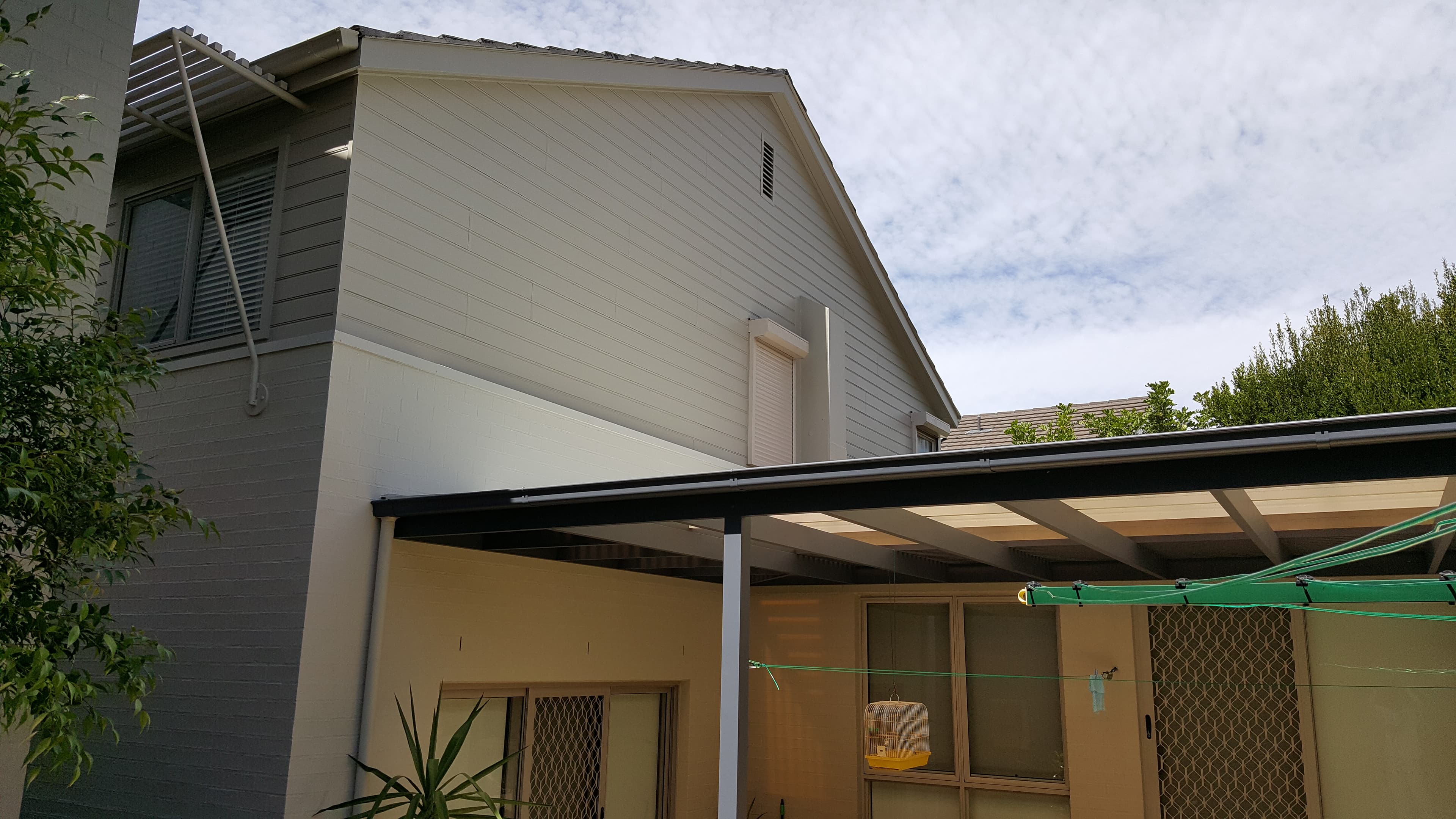 Newington rear facade and upper wall after exterior repainting