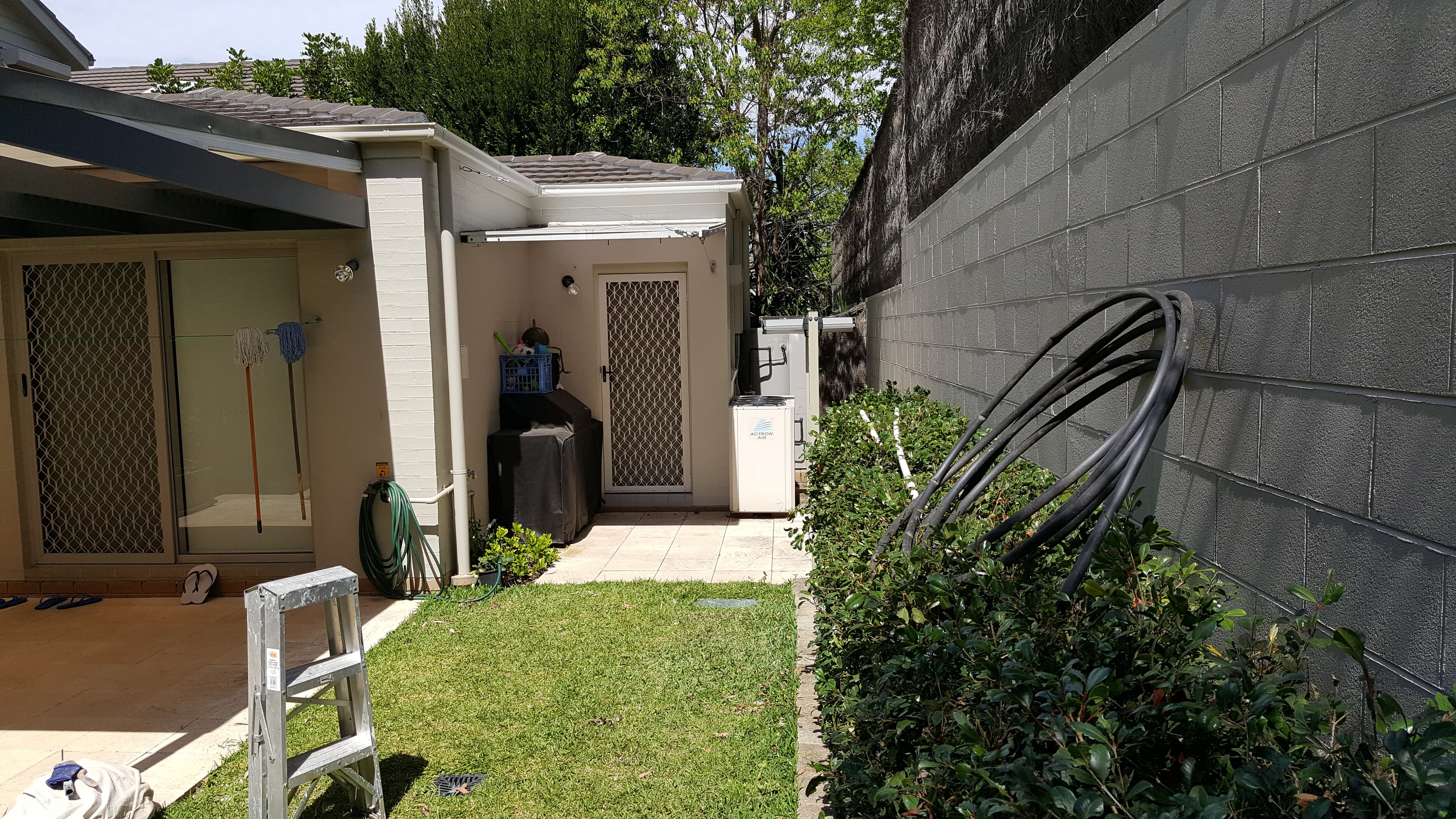 Newington side wall and service area after exterior repainting