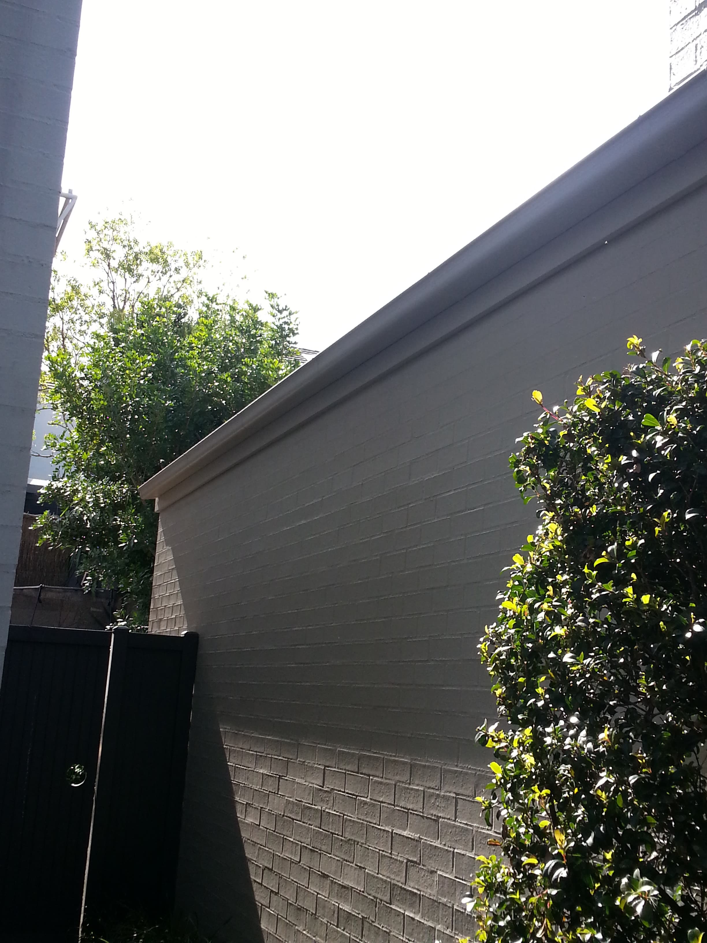 Newington grey side wall after exterior repainting