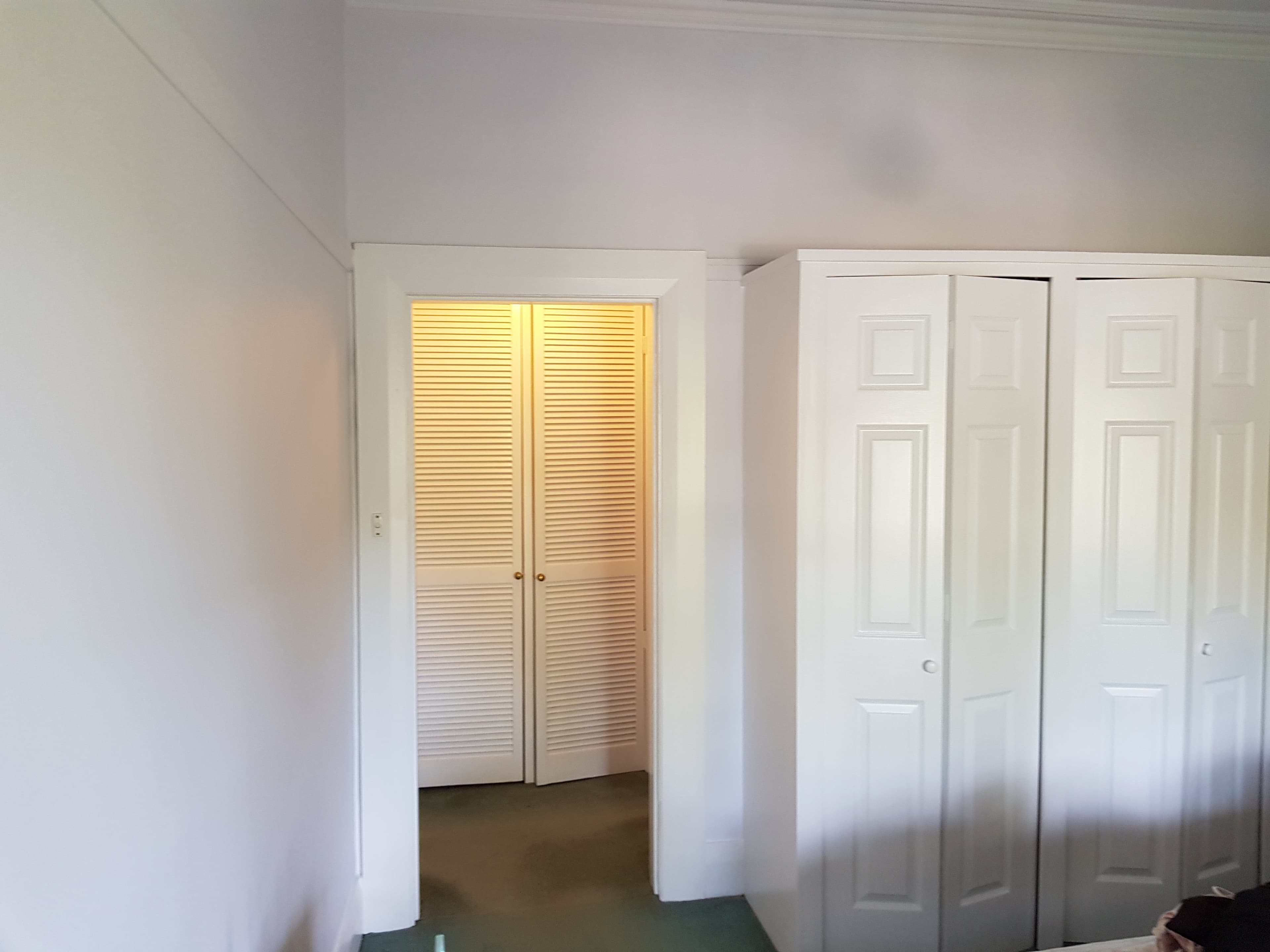 North Bridge bedroom wardrobe wall after fresh interior repainting