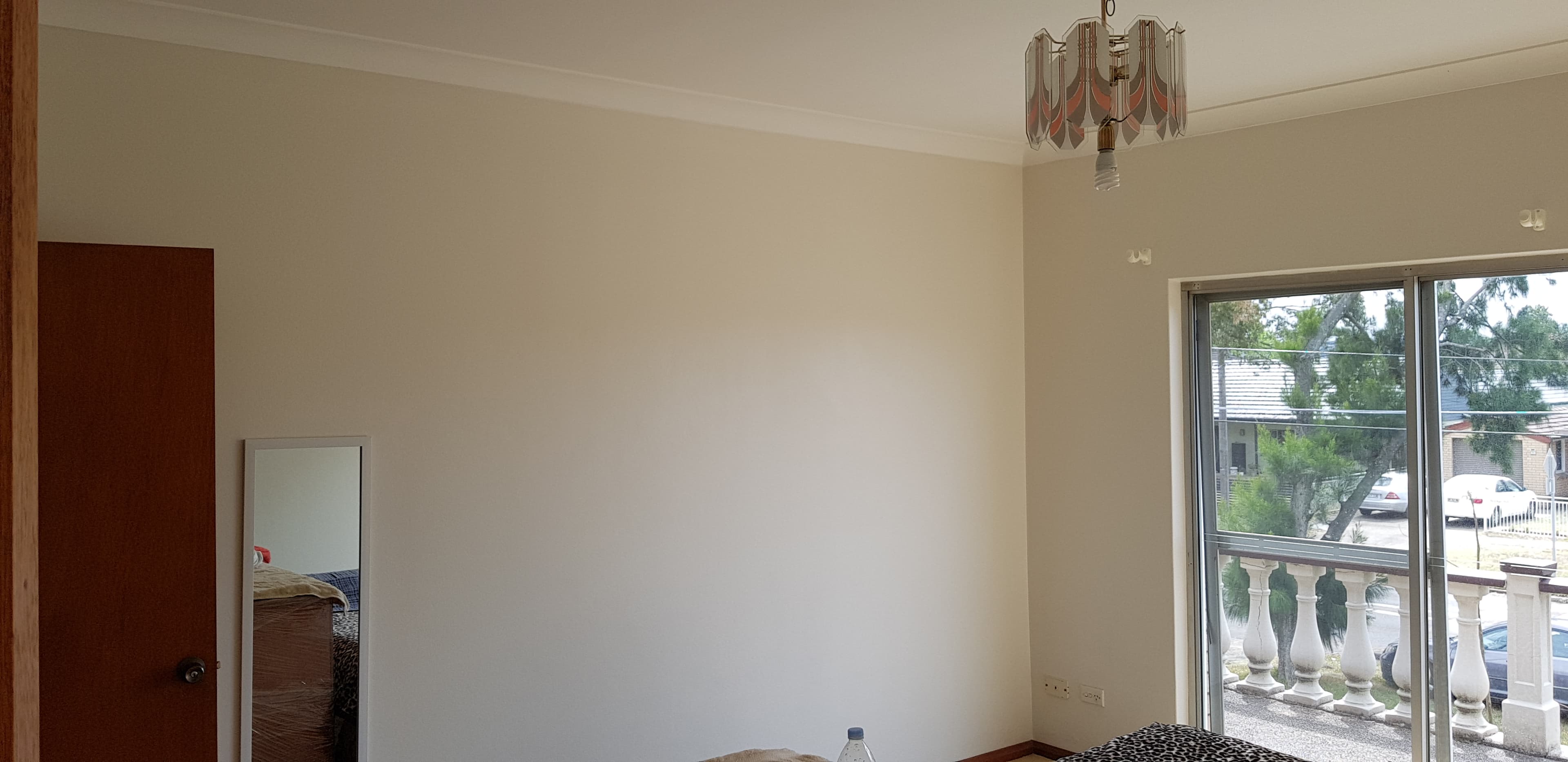 North Ryde bedroom interior after wall repainting beside window