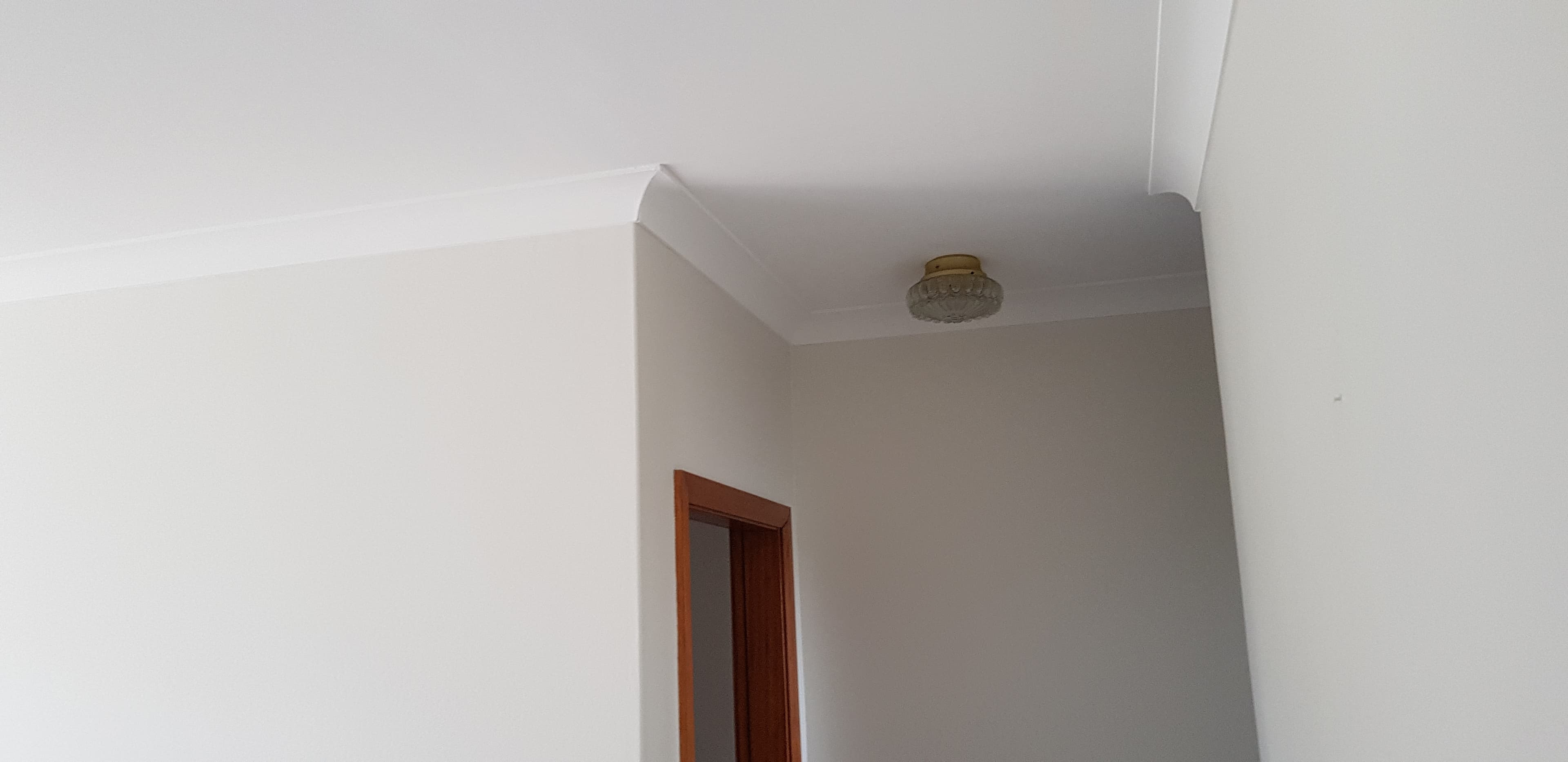 North Ryde ceiling corner and wall after repainting