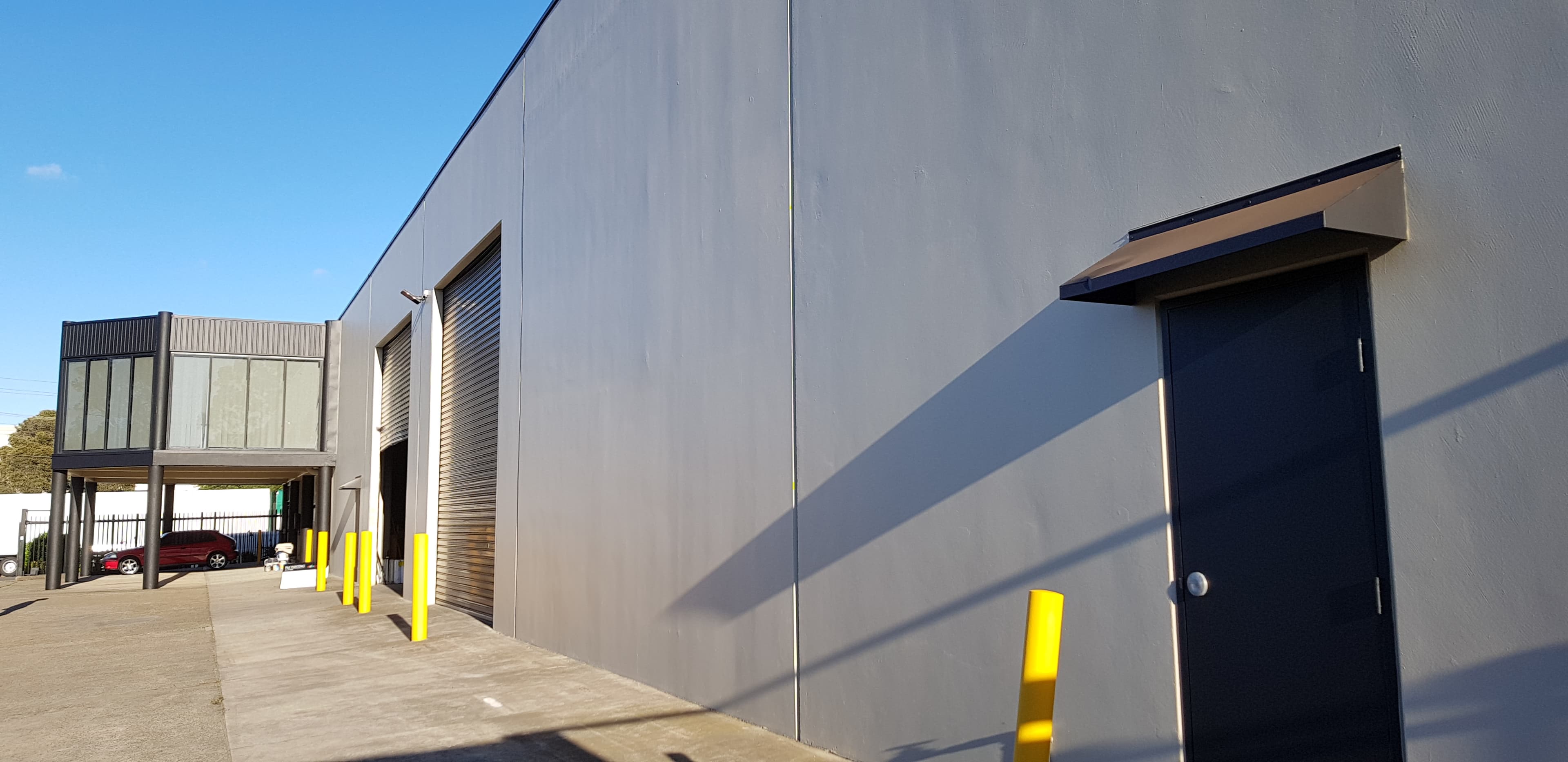 Wetherill Park commercial side wall and service door after repainting